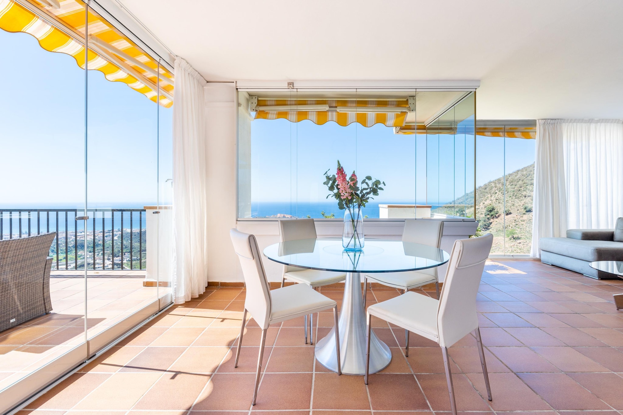 On the 1st floor: (Kitchen(boiling water tap, toaster, cooker, oven, microwave, dishwasher, fridge-freezer, Juicer), Living/diningroom(TV, dining table, seating area, balcony or terrace, air conditioning), bedroom(single bed, single bed, air conditioning), bedroom(single bed, single fold-away bed, air conditioning), Bedroom with bathroom(double bed, TV, bathtub or shower, washbasin, washbasin, toilet, air conditioning), bathroom(shower, washbasin, toilet))\n\nparking, swimming pool(shared with other guests), tennis court(shared with other guests)