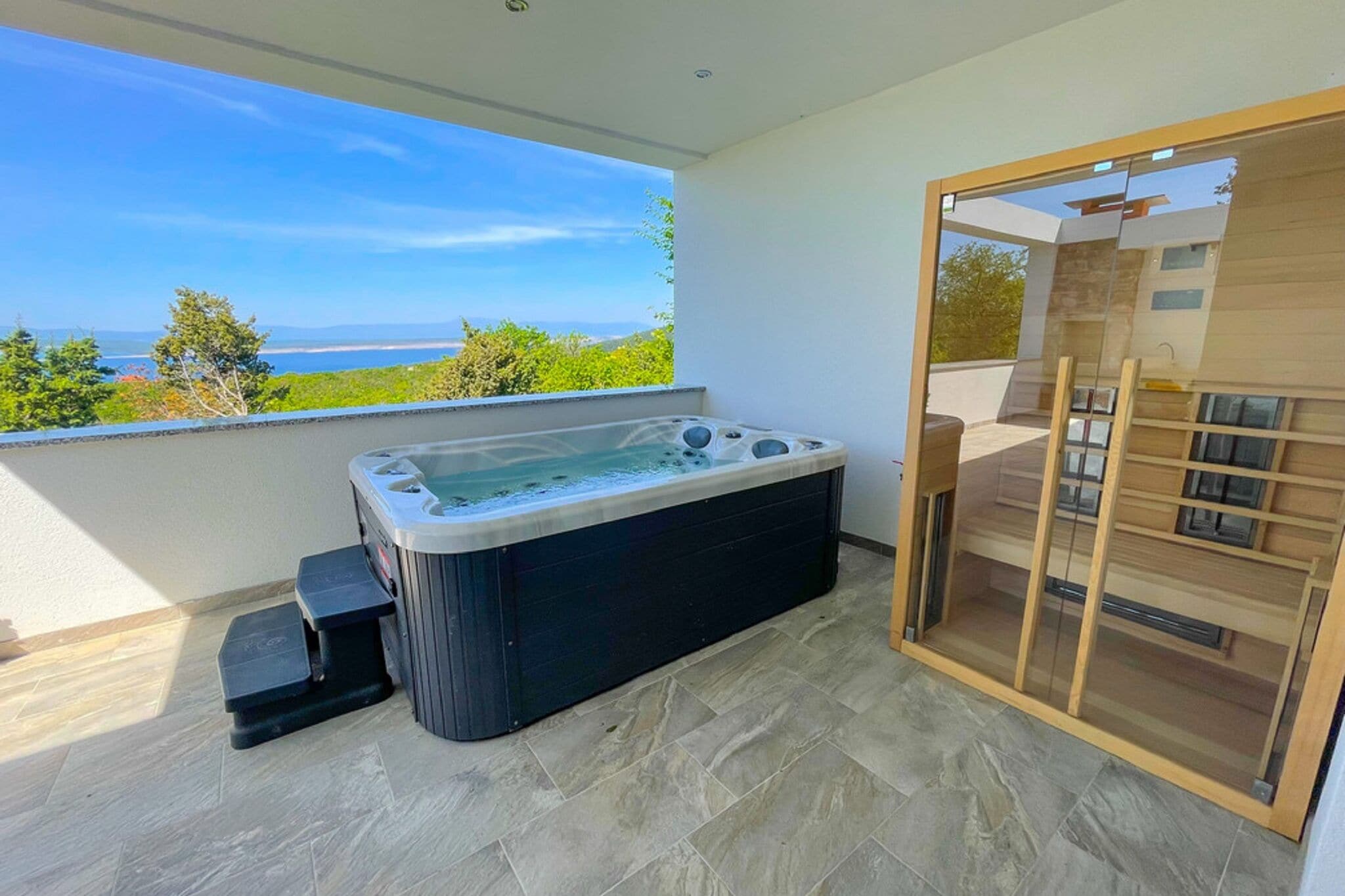 Modern holiday home with bubble bath , sauna and sea view