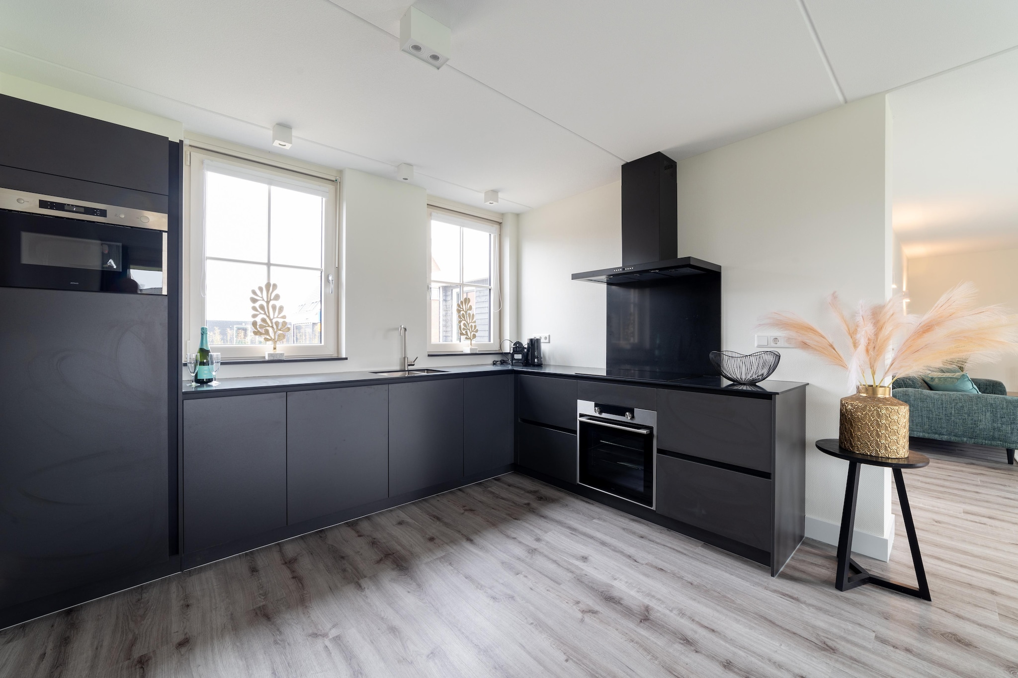 Ground floor: (open kitchen(electric kettle, coffee machine(cups), oven, microwave, dishwasher), Living/diningroom(TV(flatscreen), dining table, seating area, gas fireplace), bedroom(2x single bed, TV), bathroom(Bubble bath, shower, washbasin, toilet), toilet)\n\nOn the 1st floor: (bedroom(2x single bed), bedroom(2x single bed), bathroom(Bubble bath, shower, washbasin, toilet))\n\nsauna(private, reachable from the outside), terrace, garden, garden furniture, parking