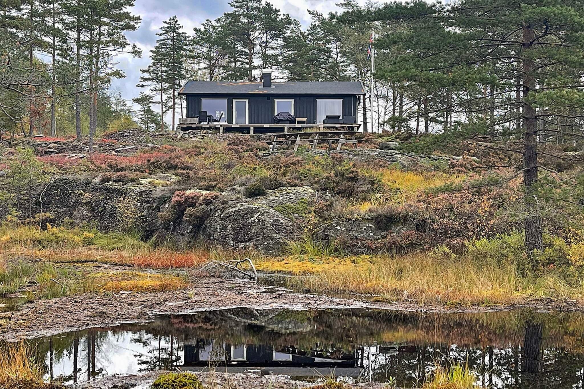 Nice holiday home in Buerskogen near Halden. The cabin is well maintained and pretty. There are three bedrooms here, one with a double bed and the other two bedrooms with bunk beds. There is an open kitchen and living room with access to a large terrace, where there is both a barbecue and an outdoor fireplace. The terrace faces west and therefore has a lot of sun. There is a separate bonfire outside with benches and a fire pan. On cold days, there is both a fireplace and a wood-burning stove inside, as well as a heat pump. The cabin is five minutes from lake Ørsjøen. Here there are three beaches to choose from. The main beach is below Buerskogen camping. Here there are docks and a raft. At the campsite itself there is a playground with trampolines. There are good fishing opportunities both in Ørsjøen, Iddefjorden and Berbyelva. There is good fishing and lots of trout and perch. The Halden area has great nature. Here there are many rivers and waters where it is nice to set out with a canoe or kayak, great hiking opportunities and the opportunity to see both moose and deer in the area. In Halden you will find nice restaurants and shops. Here is the Fredriksten fortress, and in the summer the music show Allsang på Grensen finds place. Halden is close to the Swedish border and it's not far for a bit of shopping. A short drive to Fredrikstad with its sights and the beautiful Old Town. The cabin is located 200 m from holiday home 48442 and 450 m from 54294. The cabin is not let to youth groups.