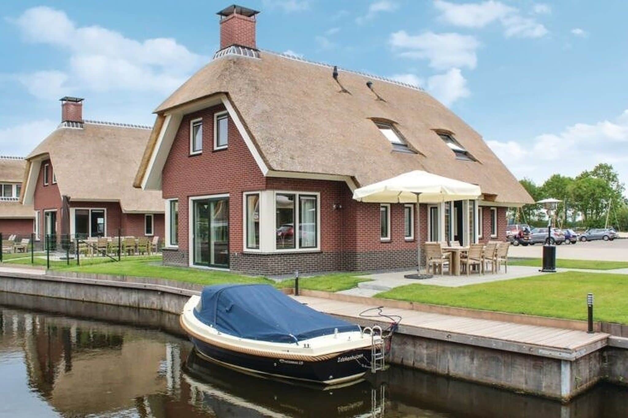 Villa with sauna, on a holiday park on the water