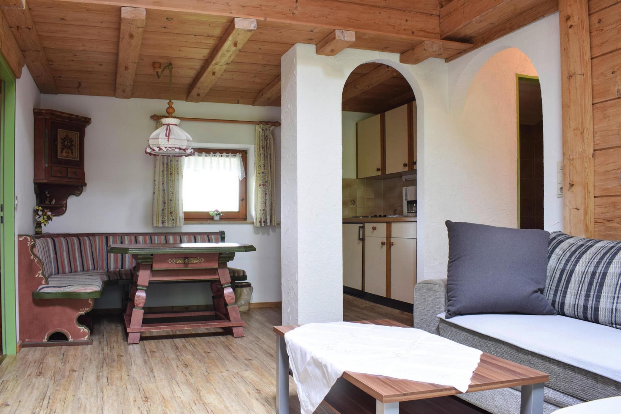 On the 1st floor: (open kitchen(electric kettle, cooker, coffee machine(filter), fridge), Living/diningroom(TV(flatscreen), dining table, seating area), bedroom(single bed), bedroom(double bed(180 x 200 cm)), bathroom(shower(walk-in shower), washbasin, toilet))\n\ncot, balcony, garden(shared with the the owner and other guests), garden furniture, parking