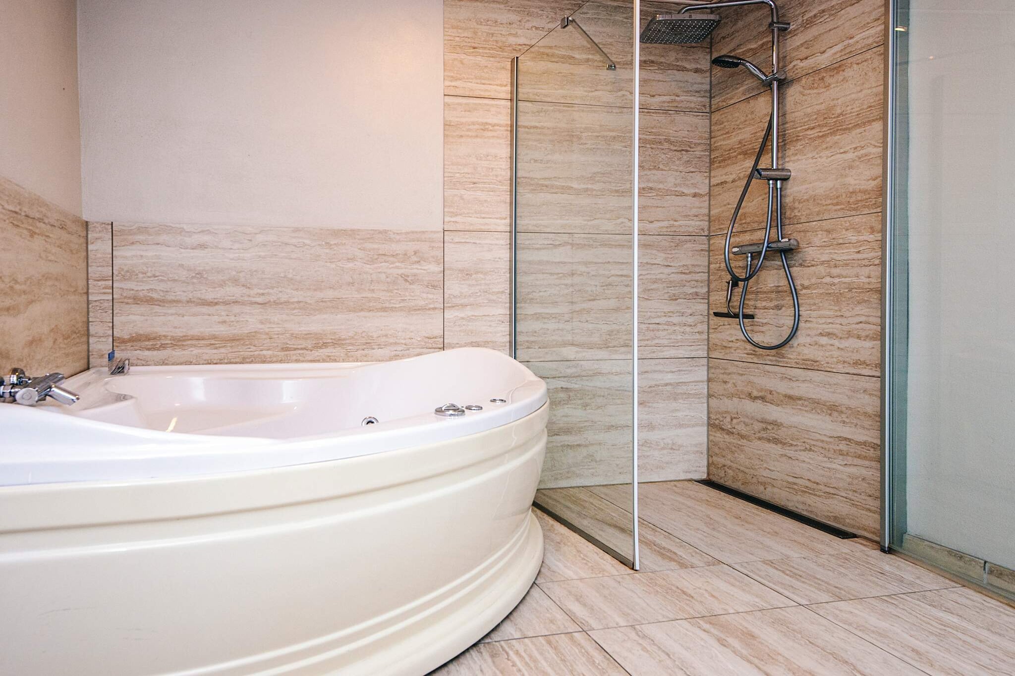 This large and spacious holiday home with a whirlpool is located on the North Sea island of RÃ¸mÃ¸, near Havneby. Just around 500 meters from the Wadden Sea, the property offers easy access to shopping and restaurants within walking distance, making it an ideal base for a relaxing and convenient holiday. The property consists of a main house and a separate annex. The main house features a large, fully equipped kitchen with a dishwasher, an adjacent dining area, and a comfortable living room. There are five bedrooms and two bathrooms, one of which includes a whirlpool and shower, providing ample space and comfort for families or groups. The annex spans nearly 40 mÂ² and includes an activity room for games and entertainment, two bedrooms, and a bathroom. Between the main house and annex, there is a beautiful enclosed courtyard, perfect for enjoying meals outdoors, relaxing in the sun, or spending quality time with family and friends. The location is ideal for both relaxation and activities. The popular SÃ¸nderstrand is only about 2.5 km away, offering opportunities for swimming, kite flying, and various outdoor activities. With both indoor and outdoor spaces, this holiday home provides a versatile setting for memorable vacations on RÃ¸mÃ¸. Whether you are seeking family fun, relaxation in the whirlpool, or proximity to the sea and local amenities, this property offers a perfect combination of comfort, space, and convenience.A refundable deposit might be charged closer to your check-in date. TheÂ securityÂ depositÂ ensuresÂ aÂ smoothÂ stayÂ andÂ coversÂ any additionalÂ servicesÂ orÂ consumptionÂ charges.ThisÂ depositÂ coversÂ utilitiesÂ consumedÂ duringÂ yourÂ stay andÂ anyÂ additionalÂ servicesÂ thatÂ mayÂ beÂ taken.TheÂ finalÂ amountÂ willÂ beÂ adjustedÂ basedÂ onÂ actualÂ meter readings,Â actualÂ usageÂ ofÂ extraÂ services,Â andÂ anyÂ remaining balanceÂ willÂ beÂ refundedÂ withinÂ 21Â daysÂ afterÂ checkout.ThisÂ depositÂ simplyÂ actsÂ asÂ aÂ prepaymentÂ forÂ chargesÂ that Â youÂ wouldÂ anywaysÂ payÂ for,Â ensuringÂ aÂ seamlessÂ stayÂ and check-outÂ experience.