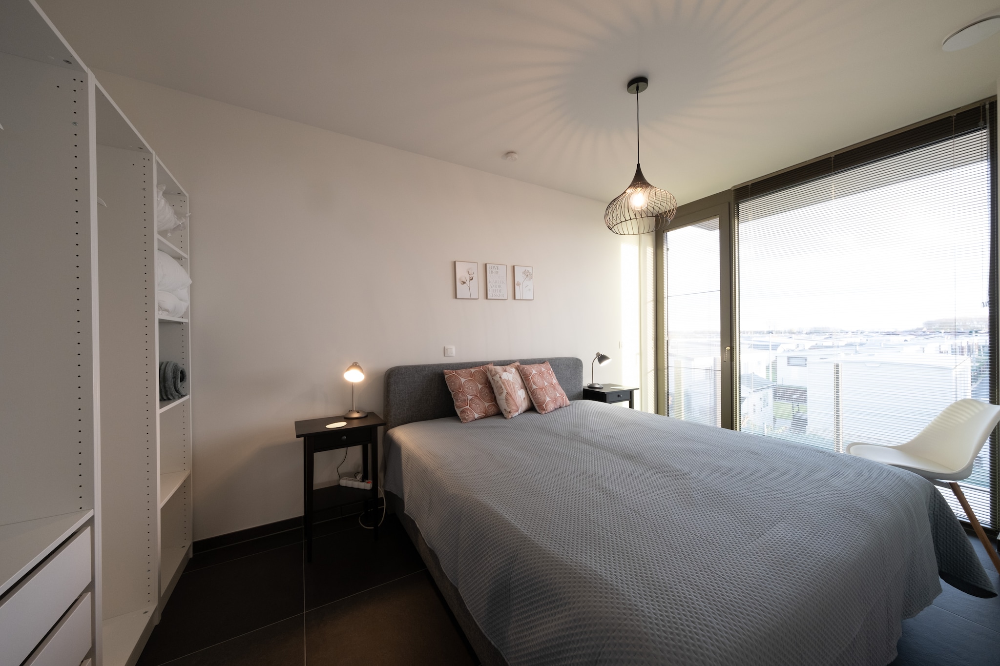 On the 1st floor: (open kitchen(electric kettle, toaster, coffee machine(pads), oven, microwave, dishwasher, fridge-freezer, Juicer, Hand blender, dishes and cutlery, Cooking basics), Living/diningroom(TV(digital), dining table, seating area, radio), bedroom(double bed(twin duvet, 180 x 200 cm)), bedroom(double bed(two single duvets, 160 x 200 cm)), bathroom(shower(walk-in shower), washbasin), toilet(washbasin, toilet), storage(bicycle room))\n\nInternet access, washing machine, terrace, parking, deckchairs, lift, children\'s bed, ironing board, iron