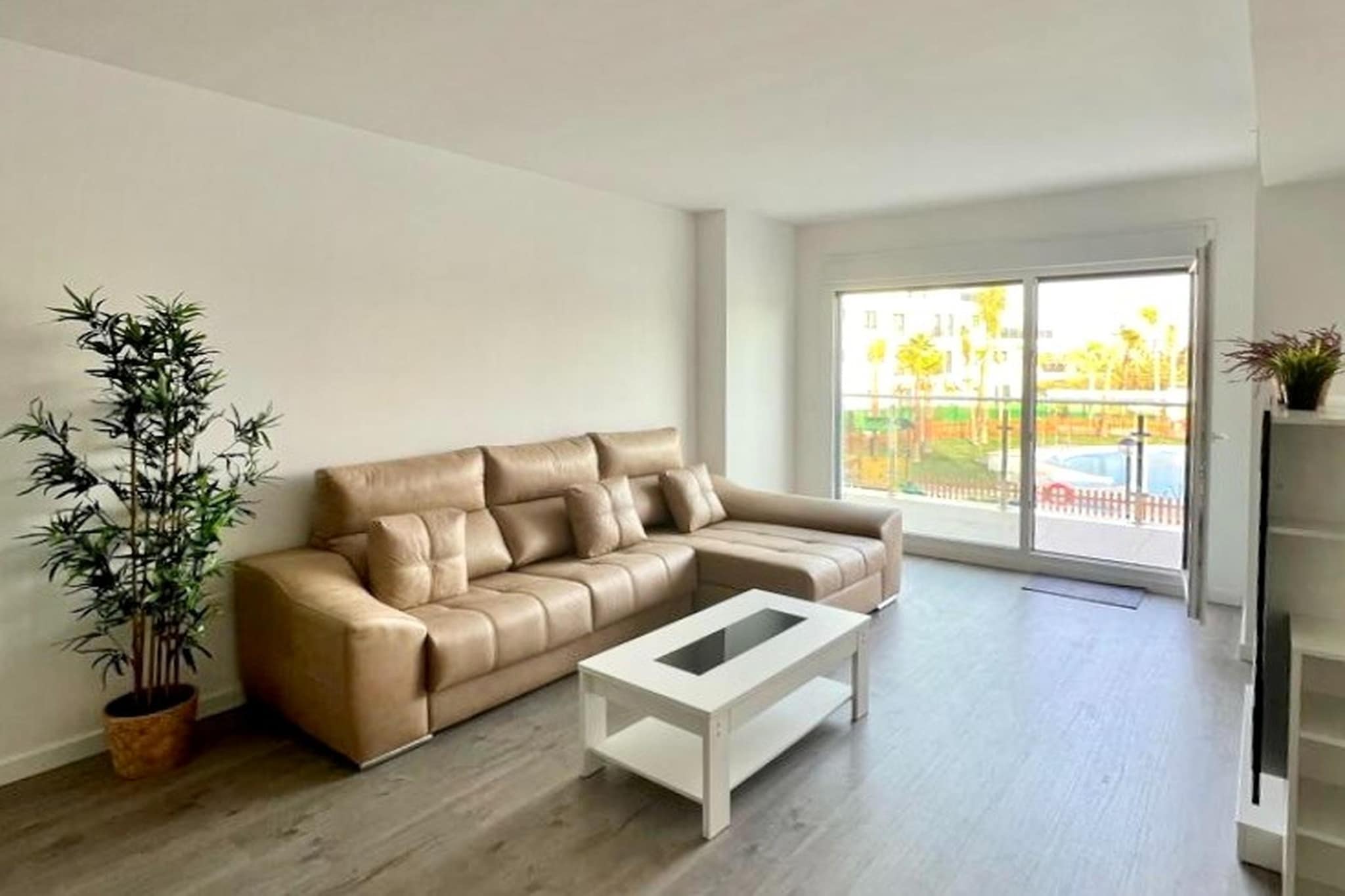 This luxury apartment is ideal for enjoying the sun and the sea throughout the year, whether it's vacations or teleworking in a unique environment. Located in exclusive urbanization, staying in this apartment will allow you to enjoy the sunny and pleasant climate of the Costa Tropical of Granada.
The nearest seabeach Playa Motril is 650 m away where you can relax and sunbathe. The restaurants are located at a short distance where you can enjoy delicious meals and drinks. There are many other tourist attractions that are worth visiting.
The swimming pools are salt water, and the gardens, the gym, and the play areas complement everything you need to enjoy a pleasant and quiet environment. The apartment has 3 bedrooms, a kitchen, and a large living room, as well as a private terrace, offering all the necessary elements for a comfortable stay, as well as a careful and modern decoration. Our guests can enjoy all the necessary services to complete a wonderful stay with free Wi-Fi throughout the apartment, air conditioning with a heat pump, free private parking, TV with streaming services, etc.
With Belvilla, an unforgettable holiday is guaranteed. We offer a wide range of unique holiday homes that will make your summer holiday, weekend getaway or skiing holiday extra special. Our range includes more than 40,000 holiday homes in 20 European countries. Whether you are looking for an authentic country house with pool in France, a charming house in Tuscany or a cosy chalet in the Alps - with us you will find the perfect accommodation for your family, as a couple or large group. Our holiday homes are located in beautiful places, be it on the coast, high in the mountains or in the middle of the city. Each house is unique and reflects the regional characteristics.
At Belvilla you enjoy absolute freedom and privacy. You can have breakfast in your pyjamas or talk undisturbed in the evening without having to worry about curfew. In your own holiday home you can prepare delicious meals with local ingredients or take a relaxing break at any time. You stay among locals and experience the authentic atmosphere of the region first hand. Our homeowners or managers are discreetly available on site and will be happy to give you valuable insider tips about the area.
At Belvilla, we are constantly on the lookout for new homes and destinations that meet the wishes of our guests. Book your holiday today and we will ensure an unforgettable stay in one of our unique holiday homes.