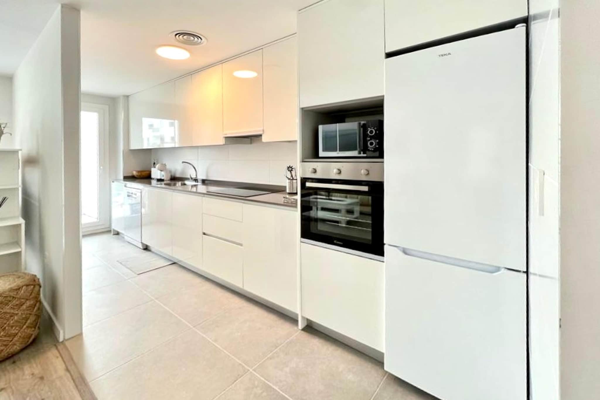 Ground floor: (Entrance(shared with other guests, reachable from the outside)(lift))\n\nOn the 1st floor: (Entrance, open kitchen(hob, boiling water tap, toaster, hood, coffee machine, oven, microwave, dishwasher, fridge-freezer, washing machine, Juicer), Living/diningroom(TV(flatscreen, smart TV, international television channels), dining table, seating area), bedroom(double bed), bedroom(bunk bed or 2 single beds), Bedroom with bathroom(double bed, bathtub with shower, washbasin, toilet, bidet, hairdryer), bathroom(shower, washbasin, toilet), heating, air conditioning, terrace(private))\n\nfitness room(shared with other guests)(fitness equipment), garage(shared with other guests, reachable from the outside), garden doors, garden furniture, swimming pool(shared with other guests, outside, including separate children’s swimming pool (depth 50cm), opened from 1/2 Jun upto and including 1/2 Sep)