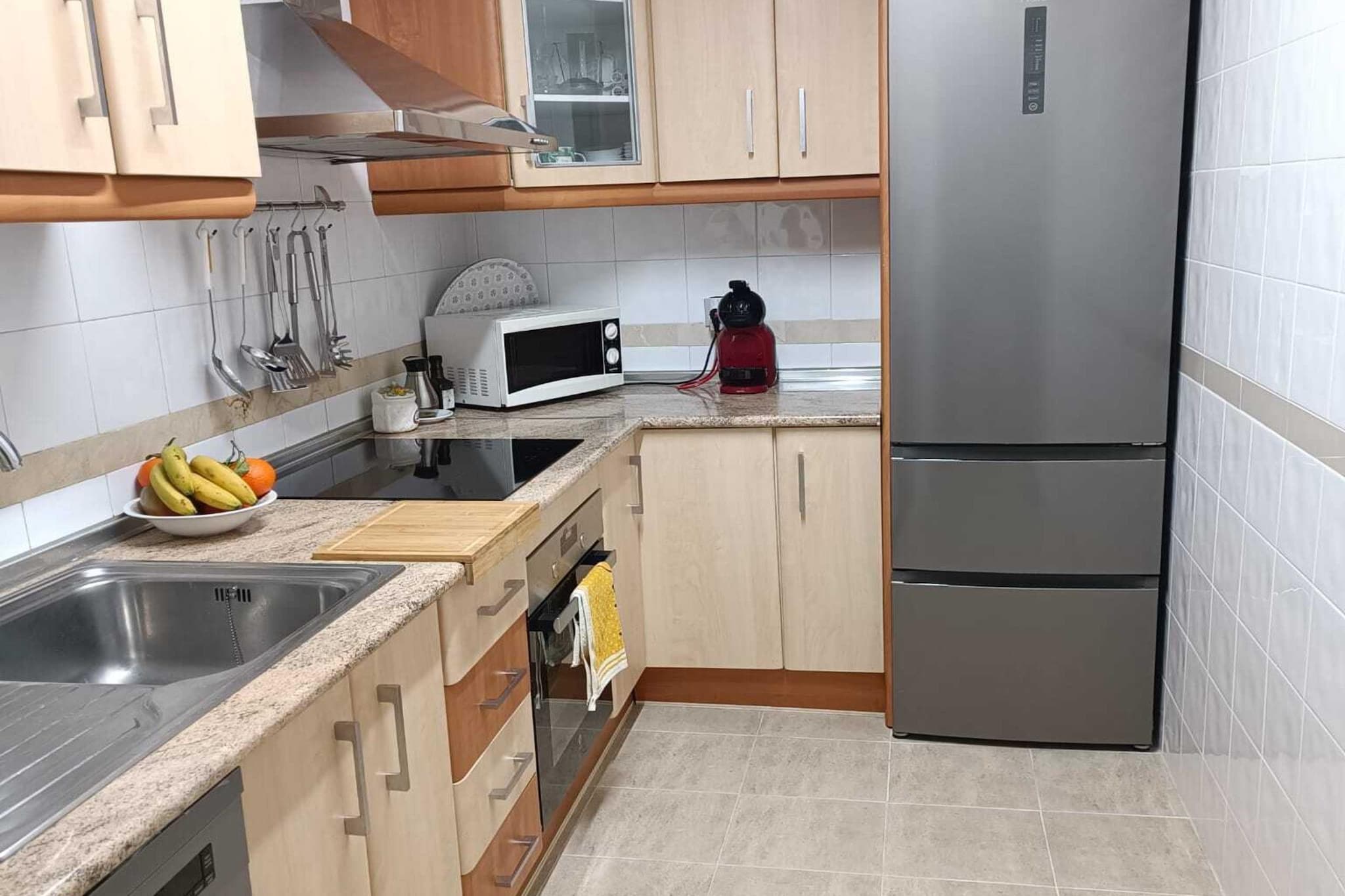 On the 3rd floor: (Kitchen(hob, oven, dishwasher, washbasin, washing machine), Living/diningroom(TV, dining table), bedroom(double bed), bedroom(single bed, single bed), bedroom(single bed), bathroom(bathtub with shower, washbasin, toilet), bathroom(shower, washbasin, toilet, bidet), balcony or terrace)\n\ncoffee machine, microwave, bathtub or shower, heating, air conditioning, terrace, garden furniture, parasol, swimming pool(shared with other guests, opened from Jun upto and including Sep), lift, ironing board