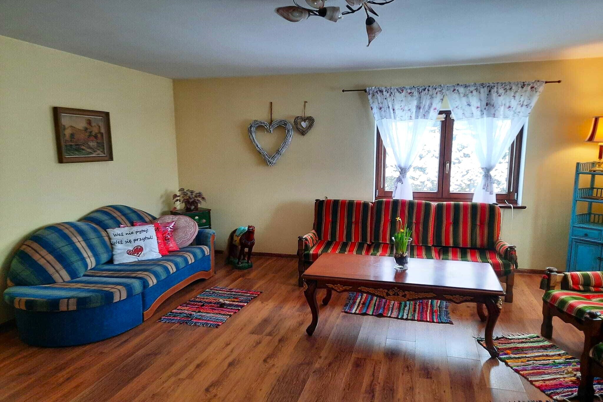 Stay in this pleasant holiday home with a unique look and a charming living room. It offers a lovely garden with barbecue and you can stay comfortably with the family or with a group of good friends.

Take beautiful walks through the attractive surroundings and taste the Polish culture in nearby places such as Piechowice, Szklarska Poręba, Podgórzyn and the Czech Harrachov, which is located just across the border. A day across the border in neighboring Germany is also possible. There are many interesting museums like Glass Museum, JUNA Earth Museum, and Sports and Tourist Museum worth a visit. There are so many activities and tourist attractions to see that you will never get bored here. 

The accommodation has a well-equipped kitchen, but you can also fire up the barbecue for a pleasant evening full of grilled delicacies. The living room is furnished with a cozy fireplace and is the ideal place for a relaxing end to the holiday.
