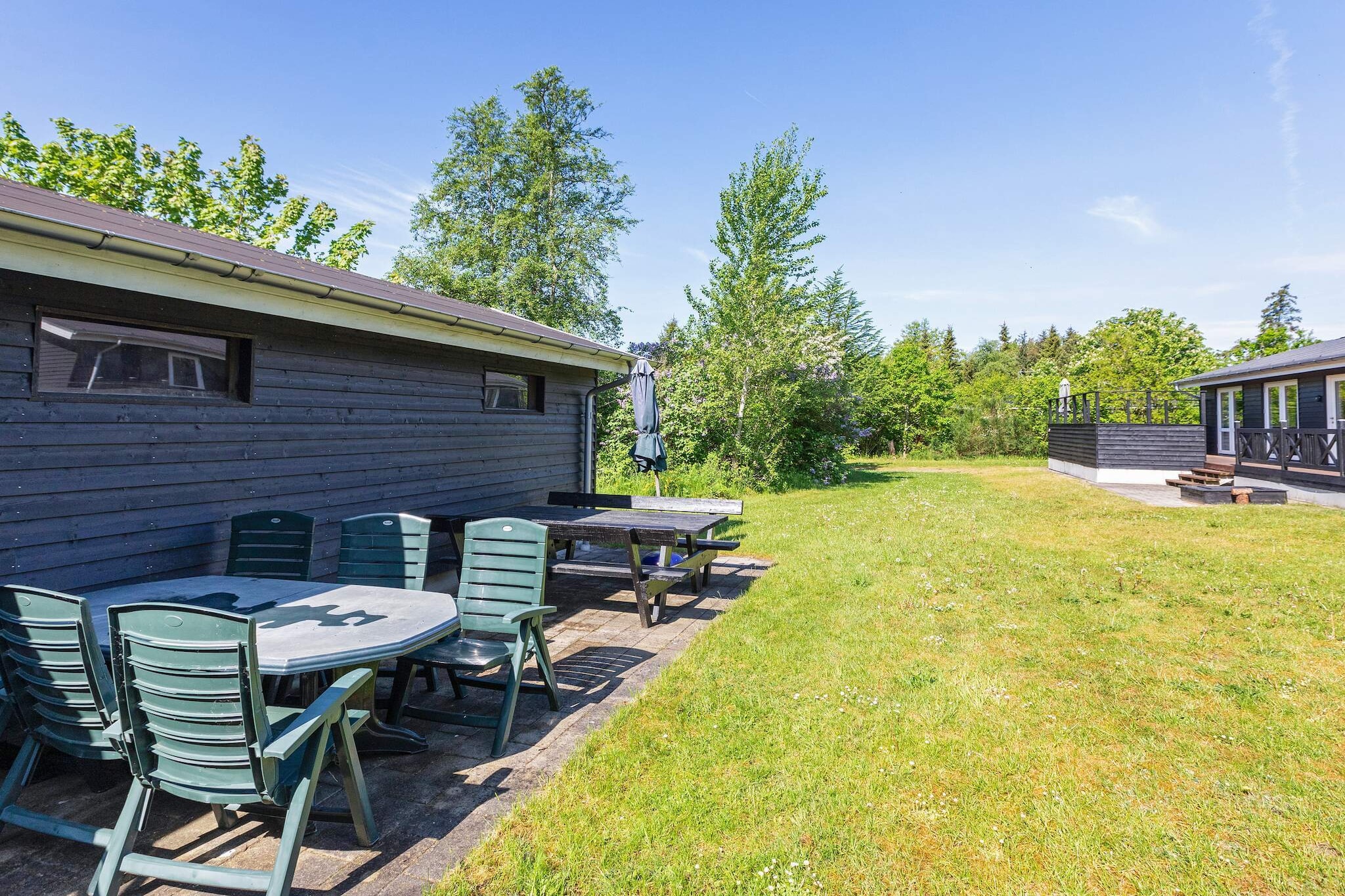 Kitchen(cooker(2 ring stoves), coffee machine, oven, microwave, dishwasher, fridge, freezer(60-99L), fridge-freezer, high chair), Living/bed room(TV, chromecast), bedroom(double bed), bedroom(double bed), bedroom(double bed), bedroom(double bed, children\'s bed), bedroom(2x bunk bed), bathroom(tumble dryer, washbasin, shower, toilet, washing machine), bathroom(washbasin, shower, toilet), heating(electric), terrace, garden furniture, play equipment, football goal