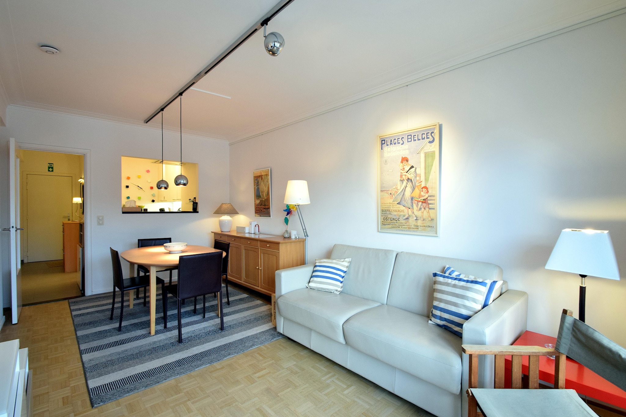 Step into this sunny, fully renovated apartment on the 3rd floor, where comfort meets contemporary charm. Featuring a spacious living area with a stylish sofa bed, a semi-open kitchen with modern appliances, and a sleek bathroom with a large walk-in shower, this space is ideal for couples or small families. Enjoy your morning coffee or evening wine on the south-facing balcony/terrace, soaking up the sun and salty breeze. With thoughtful details like a washing machine, digital TV, and private parking, every convenience is at your fingertips.

Nestled along the vibrant south side of the Zeedijk, the apartment offers dual accessâ€”both from the beachfront and the quieter rear side. Just steps from the sandy shores, you can begin or end each day with a walk along the sea without crossing busy streets. The building is equipped with an elevator, making access smooth and easy. This tranquil stretch of De Haan is known for its charm, peaceful vibe, and well-preserved Belle Ã‰poque architecture.

Savor the flavors of West Flanders just a short stroll away. Nearby, you'll find cozy bistros, beach cafÃ©s, and brasseries offering fresh seafood, Belgian specialties, and artisanal treats. For groceries or a casual coffee, the local shops and bakeries in the heart of De Haan provide everything you need. Whether you're here to relax, explore, or indulge in coastal cuisine, this pet-free apartment is the perfect seaside escape.