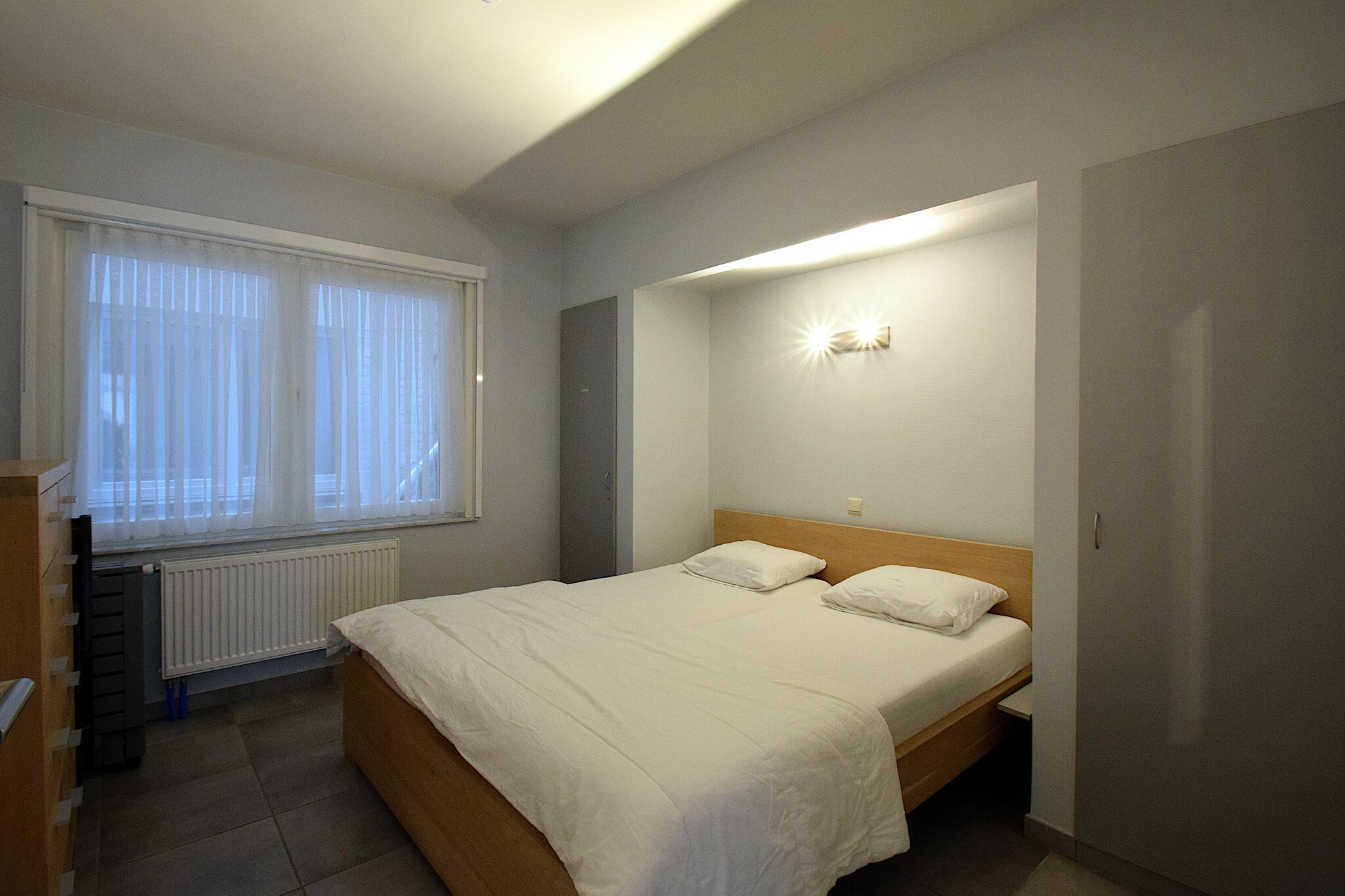 On the 1st floor: (Living room(TV, dining table, seating area, DVD player, radio), Kitchen(hob, electric kettle, toaster, coffee machine, oven, combination microwave, dishwasher, fridge-freezer), bedroom(double bed or 2 single beds(duvet)), bedroom(single bed, single bed), bedroom(single bed, single bed), bathroom(bath tub, shower, washbasin), toilet(toilet), washing machine, balcony or terrace, heating, garden furniture, lift, ironing board, iron)