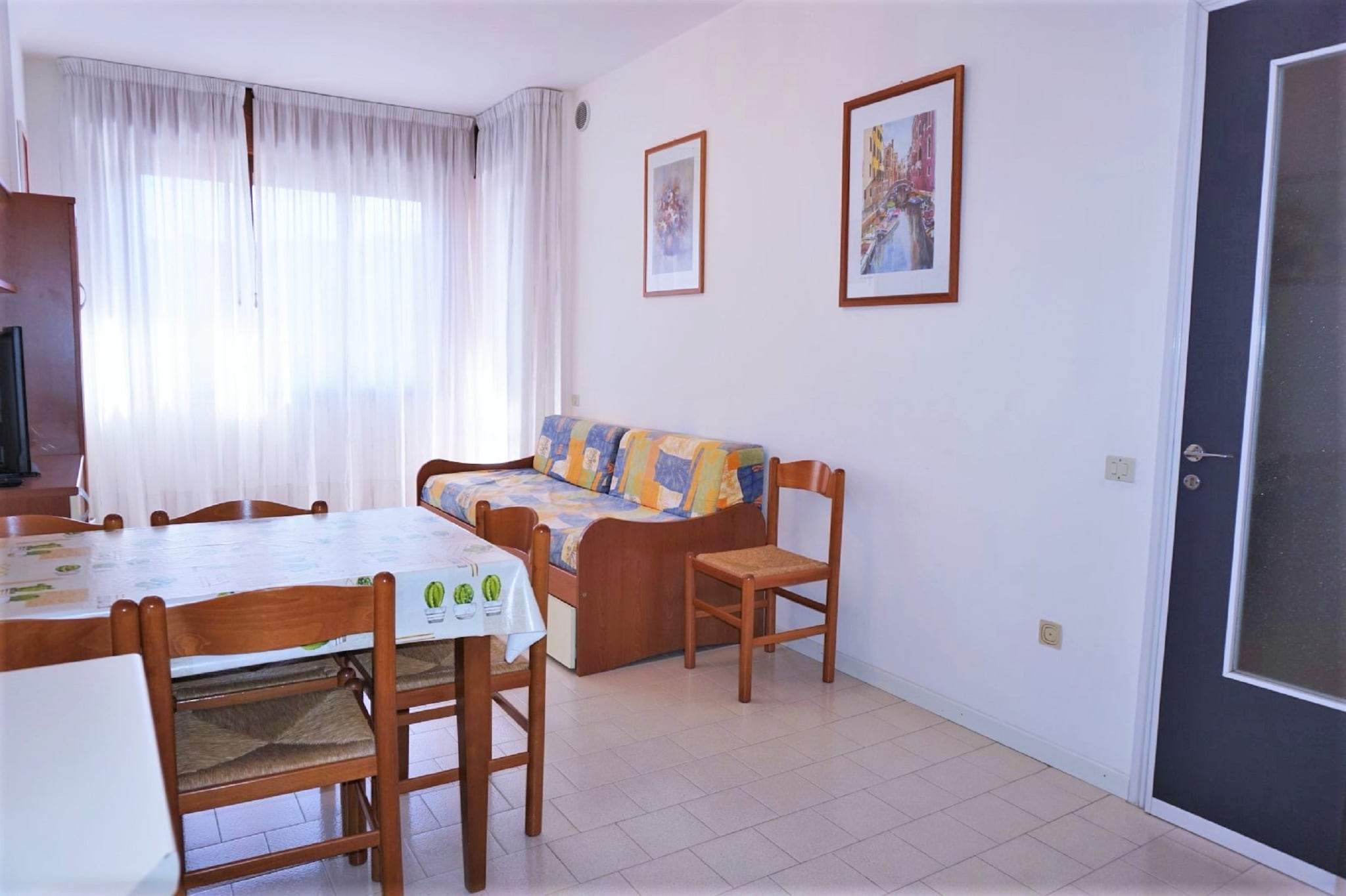 Stay in this beautiful holiday home, which has a charming private terrace where you can relax and unwind. You have an access to the swimming pool, which is shared with other guests for refreshing dips. It is ideal for families or friends.

The region around Caorle offers beautiful hiking trails and beautiful beaches, such as Spiaggia Tartaruga, a stone's throw away. Cozy bars and restaurants are within walking distance, and you can't miss a day in Venice. The border with neighboring Slovenia is also not far away, making a holiday in 2 countries possible.

With an elegant interior and various facilities, you have all the ingredients for the ultimate holiday here. In the open kitchen, you can prepare delicious meals and enjoy them together with your family on the dining table. The parking is available at the residence and the air conditioning provides pleasant cooling on hot summer days. Your four-legged friend is very welcome here.


