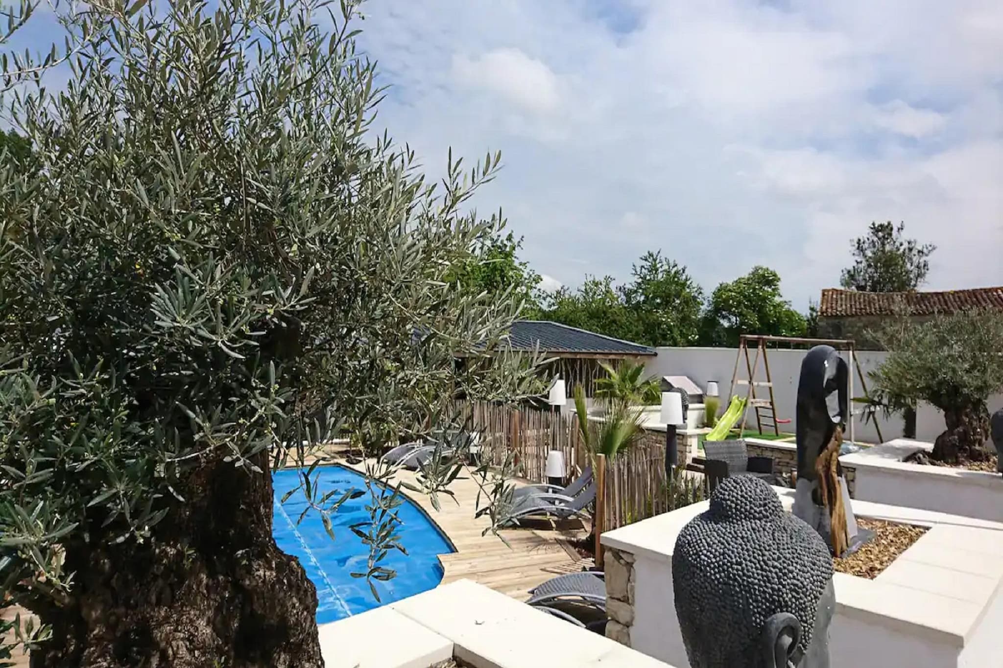 Ground floor: (Living room(TV, fireplace, seating area), dining room(dining table), Kitchen(boiling water tap, coffee machine, oven, microwave, dishwasher, fridge-freezer), bedroom(double bed), bedroom(double bed), bedroom(double bed), bathroom(shower), bathroom(shower), bathroom(shower))\n\nOn the 1st floor: (bedroom(double bed), bedroom(double bed), bedroom(double bed, double bed), bedroom(single bed, single bed, single bed, single bed, single bed, single bed), bathroom(shower), bathroom(shower), bathroom(shower))\n\nseating area, hot tub, sauna, patio, terrace, garden, garden furniture, BBQ, parking, swimming pool(private), play equipment, table football