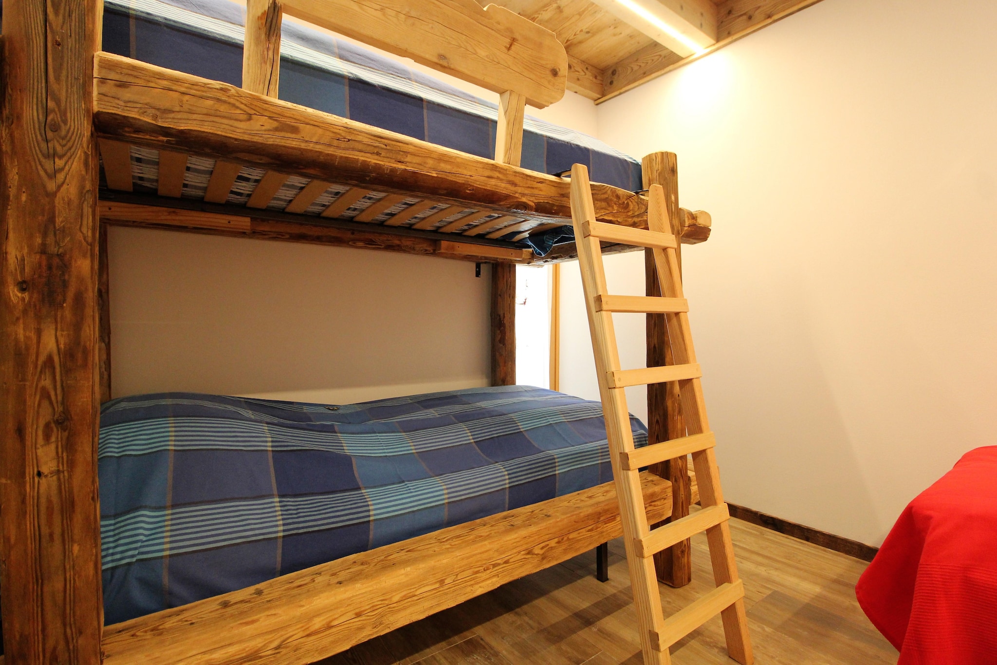 Ground floor: (bedroom(double bed), bedroom(single bed, bunk bed), bathroom(shower, washbasin, toilet, bidet, washing machine, hairdryer))\n\nOn the 1st floor: (open kitchen(hob, toaster, cooker, hood, coffee machine, oven, grill, dishwasher, fridge-freezer), Living/diningroom(TV, dining table, stove, seating area, party games), balcony or terrace, terrace)\n\nheating, garden, garden furniture, BBQ, parking, water from well