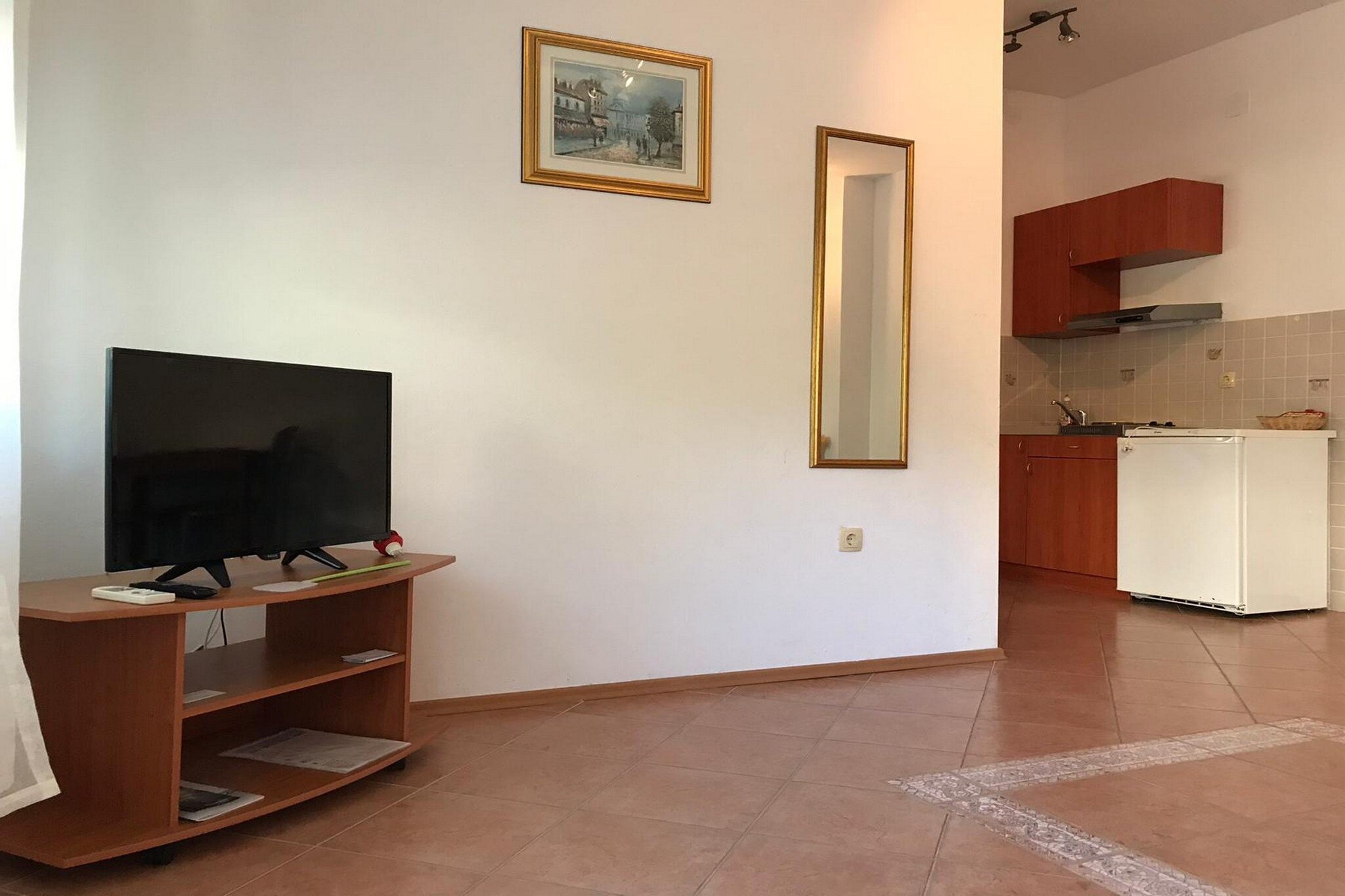 Apartments Semafor are located in a small place called Poljica, only 6 km away from Seget Vranjica.
BBQ grill as well as an outdoor dining area are at your disposal, which makes this place a perfect spot for a nice and relaxing family or friends vacation. Apartments Semafor area located only 150 m from the beach!
Private parking is provided, reservation is not required.
Free Wi-fi is available throughout the property.
Pets are welcome at this property.
This one bedroom apartment with terrace can accommodate up to four people. It features air-conditioning as well as SAT LCD TV. The open space living room comes with sofa and sitting area, and it's combined with the equipped kitchen and dining area. The private bathroom comes with shower and toilet.
This apartment is located on the ground floor.
If you want to spend your vacation in a peaceful and quiet environment, far from the city crowds, and also to have nearby all you need during your holidays, Apartments Semafor are the best choice for you. Beach is only 150 m away from the property! Market is only 30 m away, while restaurant and bar can be found 400 m away from the property.
Split airport is 14 km from the property, while bus stop is only 200 m away.