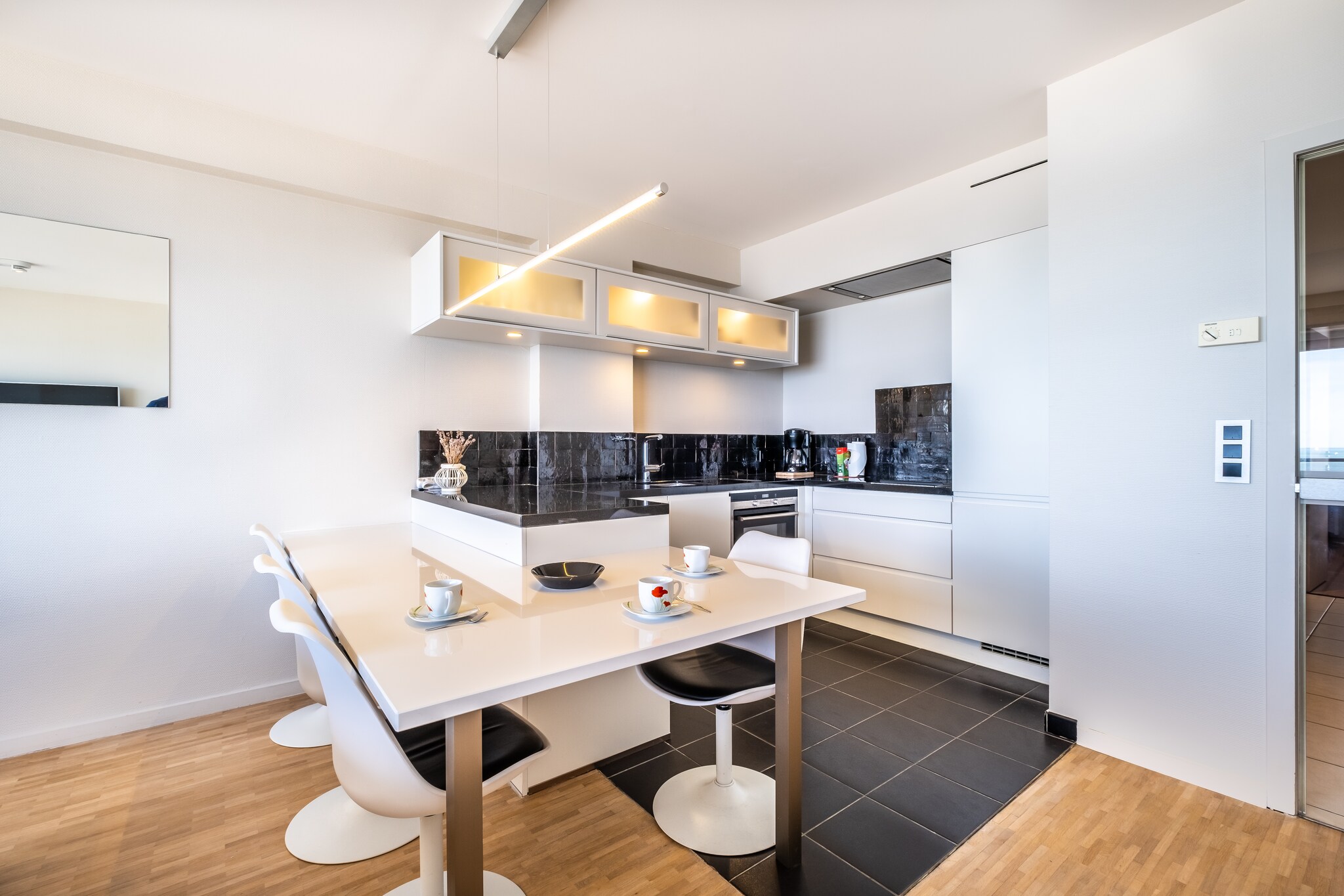 On the 6th floor: (Living room(TV(flatscreen, digital), dining table(4 persons), seating area), Kitchen(hob(ceramic), electric kettle, hood, coffee machine, oven, combination microwave, dishwasher, fridge(+ freezer)), bedroom(double bed(twin duvet, 180 x 200 cm)), bedroom(double sofa bed(twin duvet, 160 x 200 cm)), bathroom(bathtub with shower, washbasin), toilet(toilet))\n\nbalcony, heating(electric), garden furniture, lift