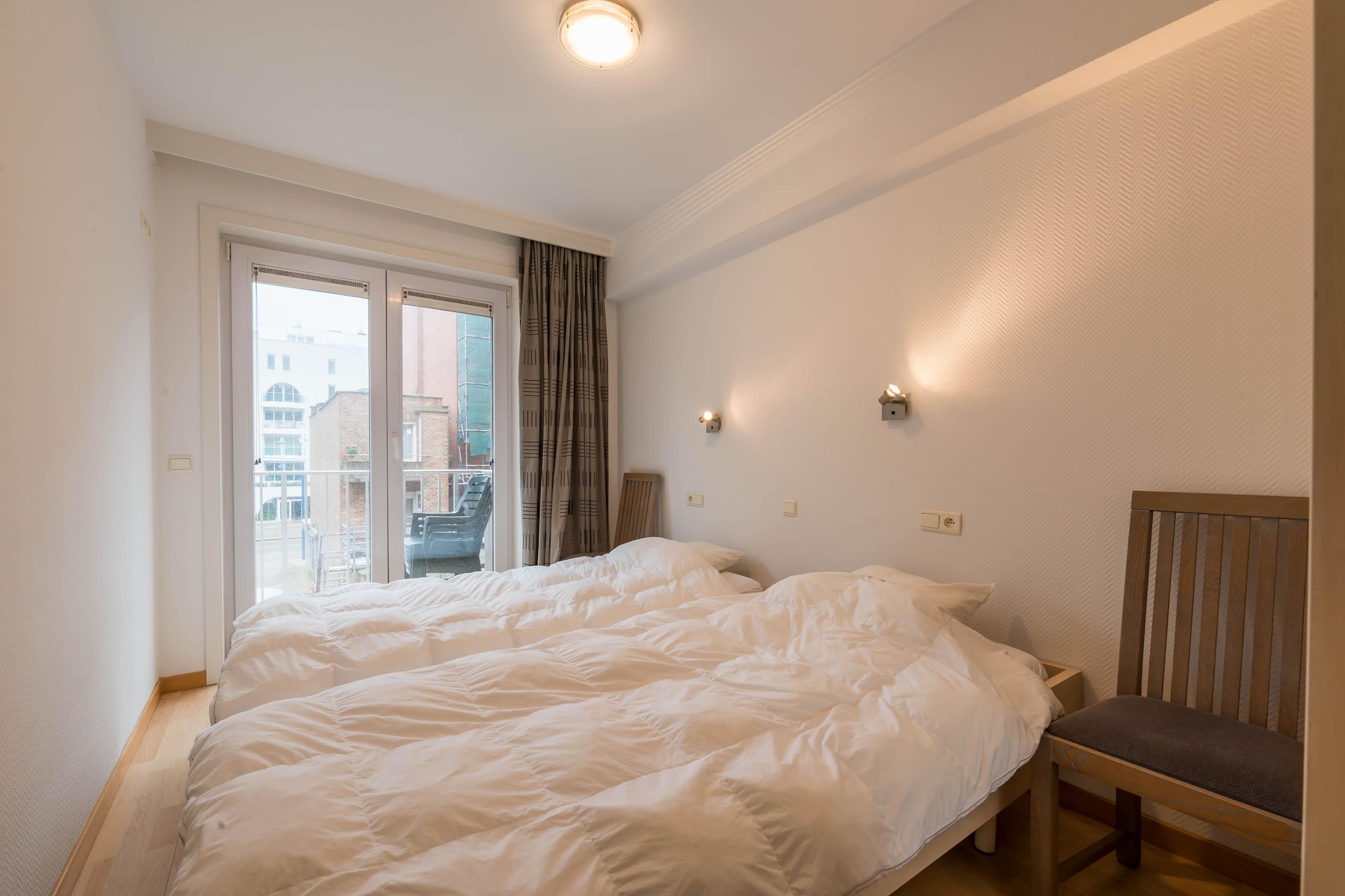 On the 2nd floor: (open kitchen(hob(ceramic), electric kettle, hood, coffee machine(cups), combination microwave, dishwasher, fridge(+ freezer), fridge(+ freezer), Hand blender), Living/diningroom(double sofa bed, TV(flatscreen, digital), dining table(6 persons), seating area, balcony), bedroom(double bed or 2 single beds(duvet, 90 x 200 cm), balcony), bedroom(single bed(duvet, 90 x 200 cm), single bed(duvet, 90 x 200 cm)), bathroom(shower, washbasin), toilet(toilet))\n\ngarage, heating(electric), garden furniture, lift