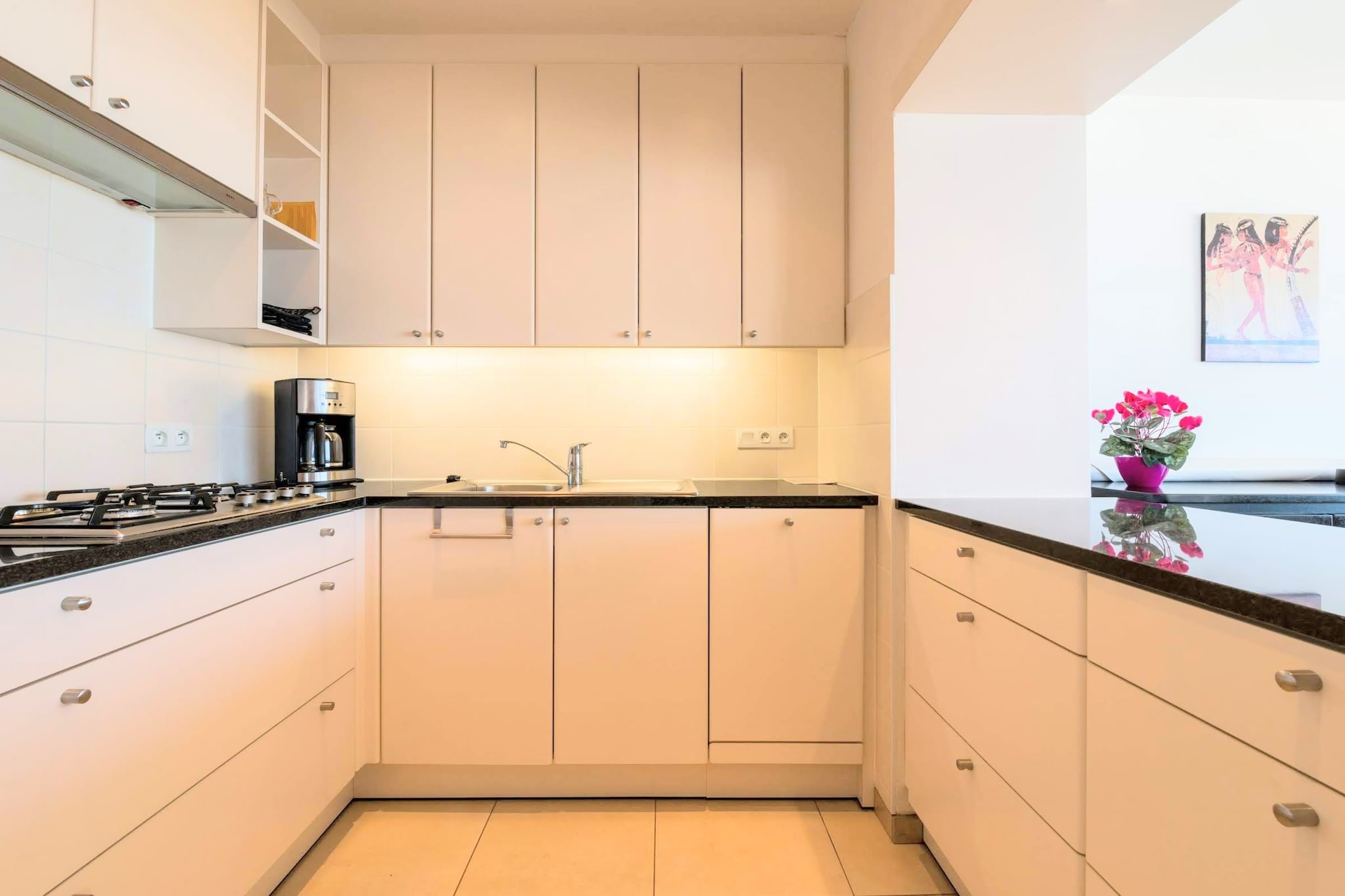 On the 5th floor: (Kitchen(hob(gas), electric kettle, toaster, coffee machine, combination microwave, dishwasher, fridge(+ freezer), Hand blender), Living/diningroom(double sofa bed(twin duvet, 140 x 200 cm), TV(flatscreen, digital), dining table(6 persons), seating area), bedroom(single bed(duvet, 90 x 200 cm), single bed(duvet, 90 x 200 cm), washbasin), bedroom(double bed(twin duvet, 160 x 200 cm), washbasin), bathroom(bathtub with shower, washbasin), toilet(toilet))\n\nbalcony, heating(gas), lift, ironing board, iron