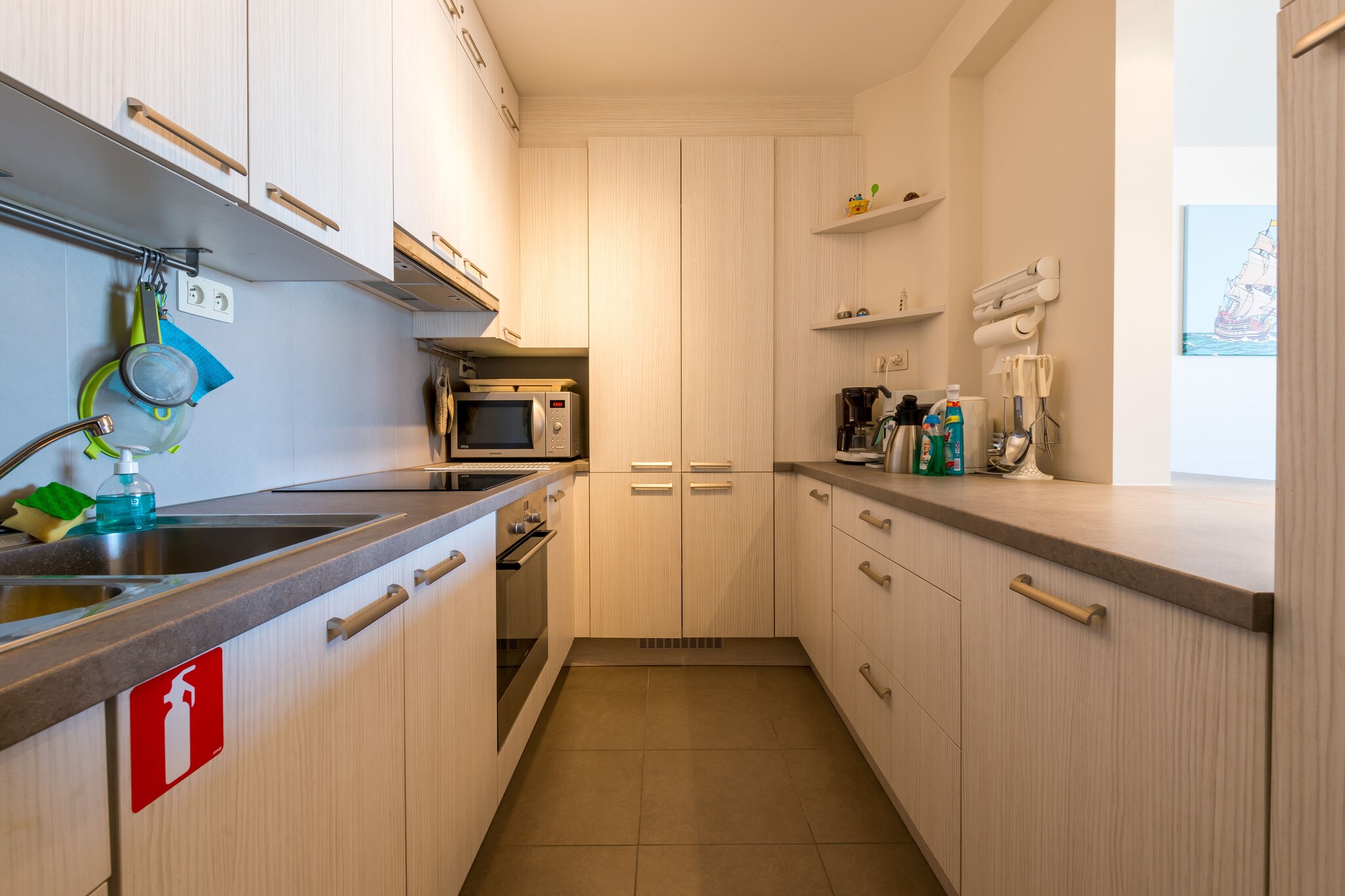 Ground floor: (Kitchen(hob(ceramic), electric kettle, toaster, coffee machine, oven, combination microwave, dishwasher, fridge(+ freezer), Hand blender), Living/diningroom(TV(flatscreen, digital), dining table(8 persons), seating area), bedroom(double bed(twin duvet), washbasin), bedroom(double bed(twin duvet), washbasin, children\'s bed), bedroom(bunk bed(duvet), bunk bed(duvet), washbasin), bathroom(bath tub, shower, washbasin))\n\ntumble dryer, washing machine, balcony, heating(central, gas), lift, high chair