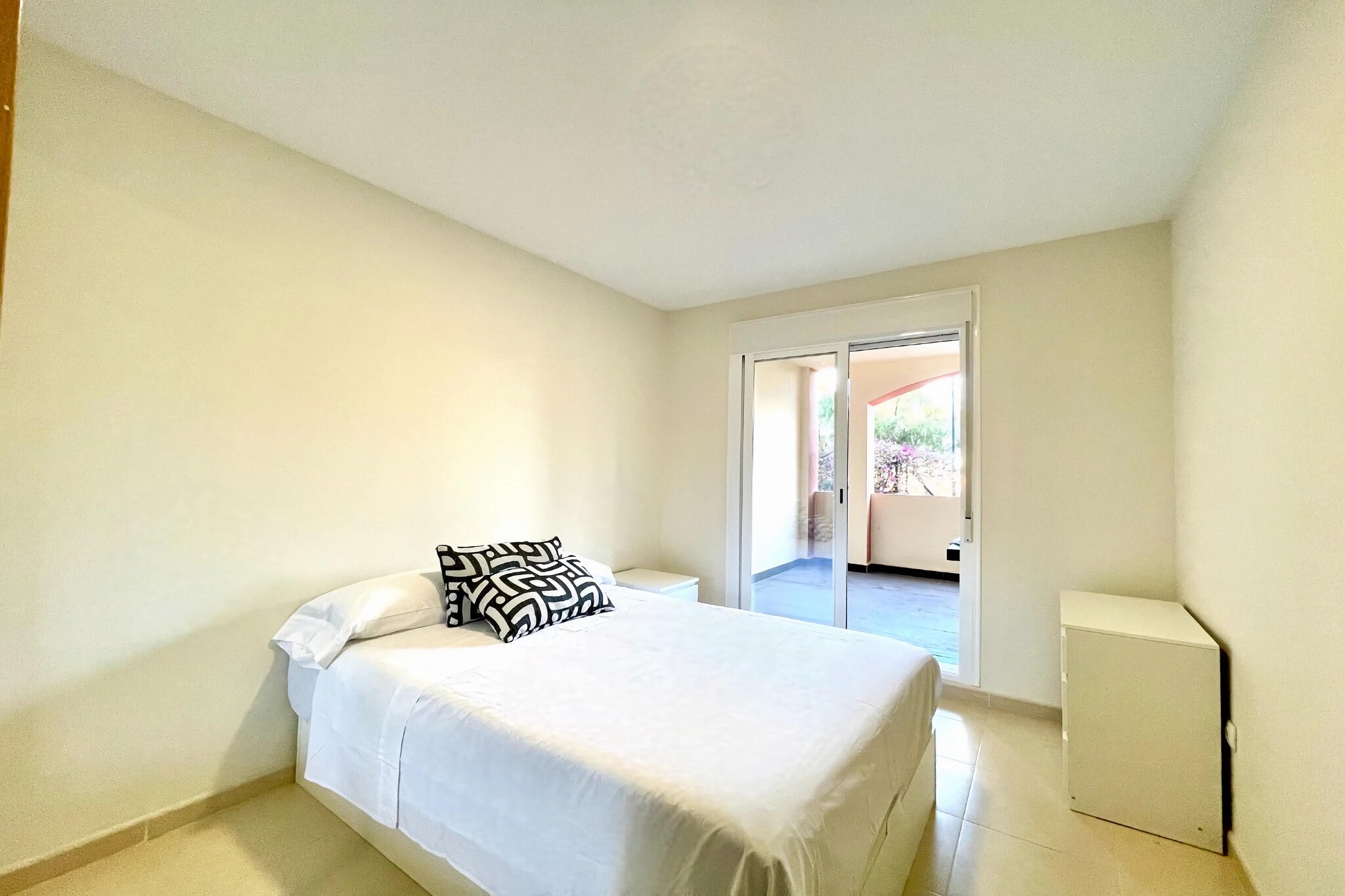 Ground floor: (Entrance, open kitchen(hob, toaster, coffee machine, oven, microwave, fridge-freezer, washing machine, Blender), Living/diningroom(double sofa bed, TV(flatscreen), dining table, seating area), bedroom(bunk bed or 2 single beds), bedroom(double bed(135 x 190 cm)), bathroom(bath tub, washbasin, bidet), bathroom(shower, washbasin, washing machine), garden doors, terrace(private, 40 m2), garden furniture)\n\nsun shower, garden(shared with other guests), parking lot(public), swimming pool(shared with other guests, outside, opened from 1/2 Jun upto and including 1/2 Sep), ironing board, iron