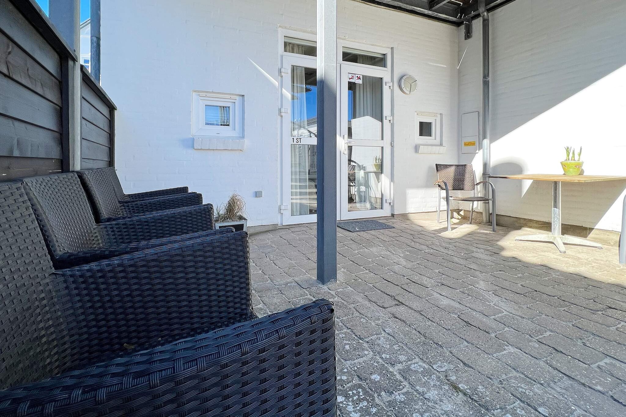 This charming holiday apartment is fantastically located in the heart of Løkken, just 200 meters from one of Denmark’s most beautiful and widest North Sea beaches. Nestled in a small side street, the apartment offers peace and quiet while still being only about 50 meters from the town’s cozy marketplace, where shops, cafés, and restaurants invite you to explore the local atmosphere. The combination of central location and proximity to the beach makes this property ideal for a memorable holiday at any time of year. The apartment is bright, airy, and well-appointed, offering a welcoming setting for both relaxation and family time. The living area includes a TV with streaming capabilities and a double sofa bed, while the separate bedroom features a comfortable double bed. The open layout allows for socializing and togetherness, while still providing privacy when needed. Every detail has been considered to ensure comfort and convenience for guests, making it easy to settle in and enjoy your stay. From the end of the living room, you can access a small, cozy terrace that is perfect for evening gatherings around the garden grill. Here, you can enjoy meals outdoors while listening to the soothing sound of the waves in the distance. Parking is available in connection with the apartment, and guests also have free access to the Blokhus water park, offering additional fun for families. This property provides an ideal blend of seaside relaxation, town amenities, and comfortable living for an unforgettable holiday experience.A refundable deposit might be charged closer to your check-in date. The security deposit ensures a smooth stay and covers any additional services or consumption charges.This deposit covers utilities consumed during your stay and any additional services that may be taken.The final amount will be adjusted based on actual meter readings, actual usage of extra services, and any remaining balance will be refunded within 21 days after checkout.This deposit simply acts as a prepayment for charges that  you would anyways pay for, ensuring a seamless stay and check-out experience.