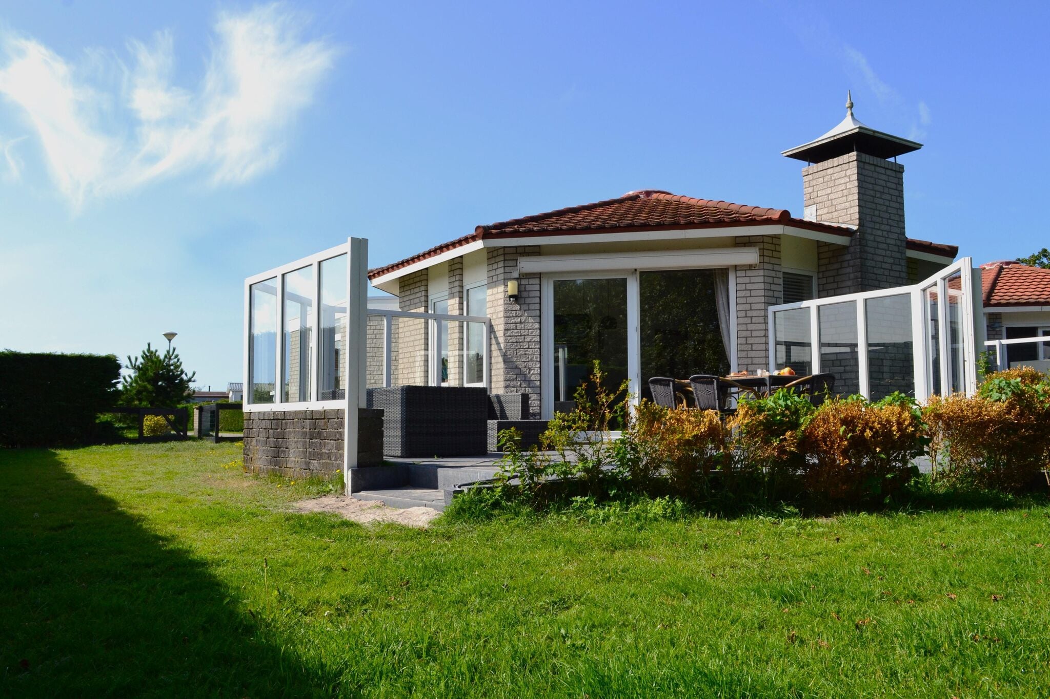 Belle maison de vacances directement sur le terrain de golf d'Ameland