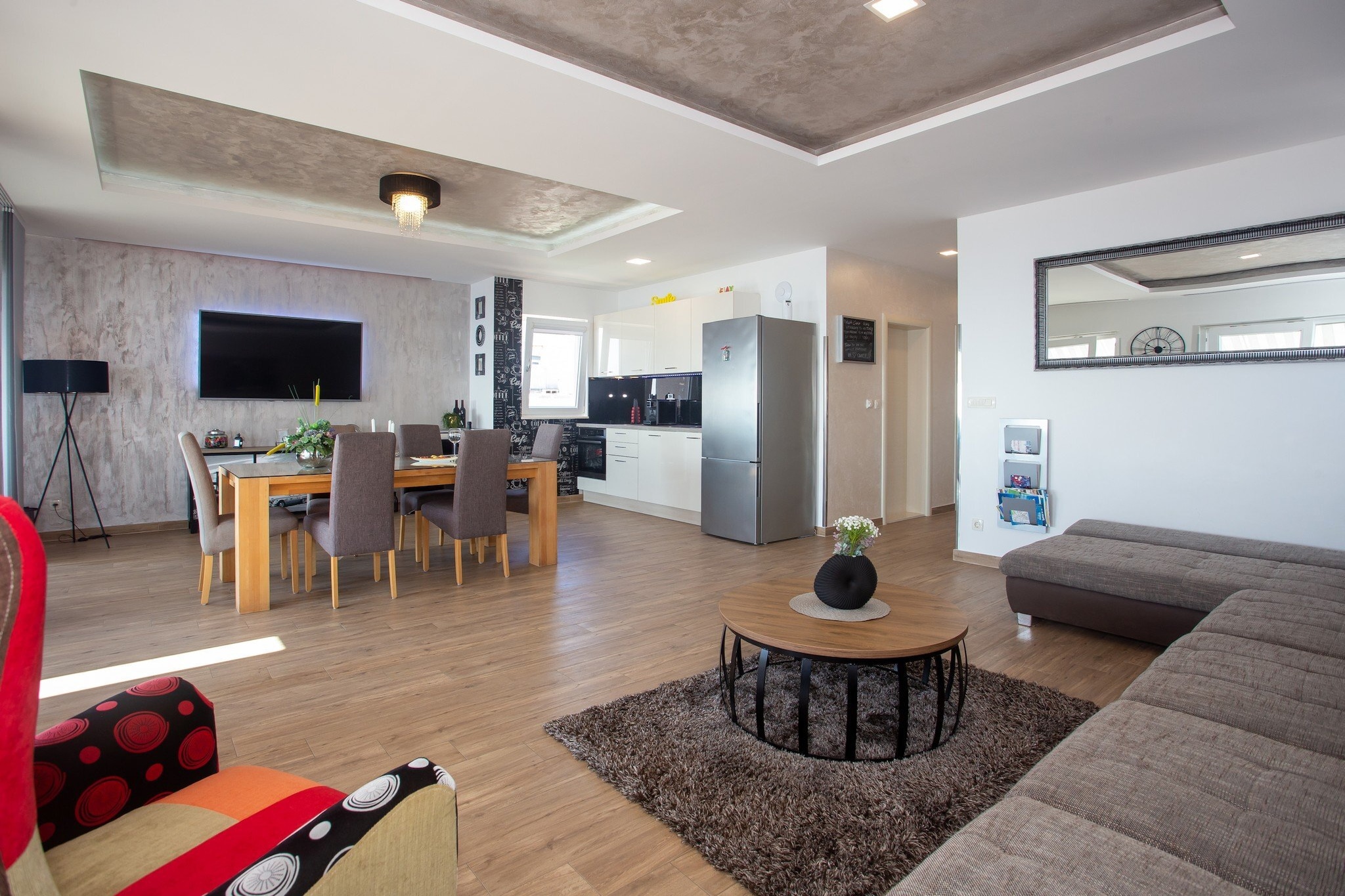 Apartments Aqua is located in Okrug Gornji located in the beautiful traditional village Okrug Gornji on the Island of Čiovo which is connected with the mainland to historic Trogir. 

Spacious terrace fitted with sun beds and parasols as well as a common seasonal outdoor swimming pool and a shared garden are at your disposal.

Private parking is provided.

Outdoor shower, hot tub and gym are at guests disposal.

Seasonal heated outdoor pool is opened from 01.05.-30.10.

This two bedroom apartment with terrace and sea view is perfectly fit for up to six people. It features free air conditioning as well as  LCD TV. The open space living room comes with sofa and sitting area, and it's combined with the equipped kitchen and dining area. The private bathroom comes with shower and toilet.
Hair dryer as well as linens and towels are at your disposal.

If you want to spend your vacation in a peaceful and quiet environment, far from the city crowds, and also to have nearby all you need during your holidays, Apartments Aqua
is the best choice for you. Beach is only 70 meters from the property! Market is 80 m while restaurant and coffee bar are 400 m away.

Split airport is only 7 km away.