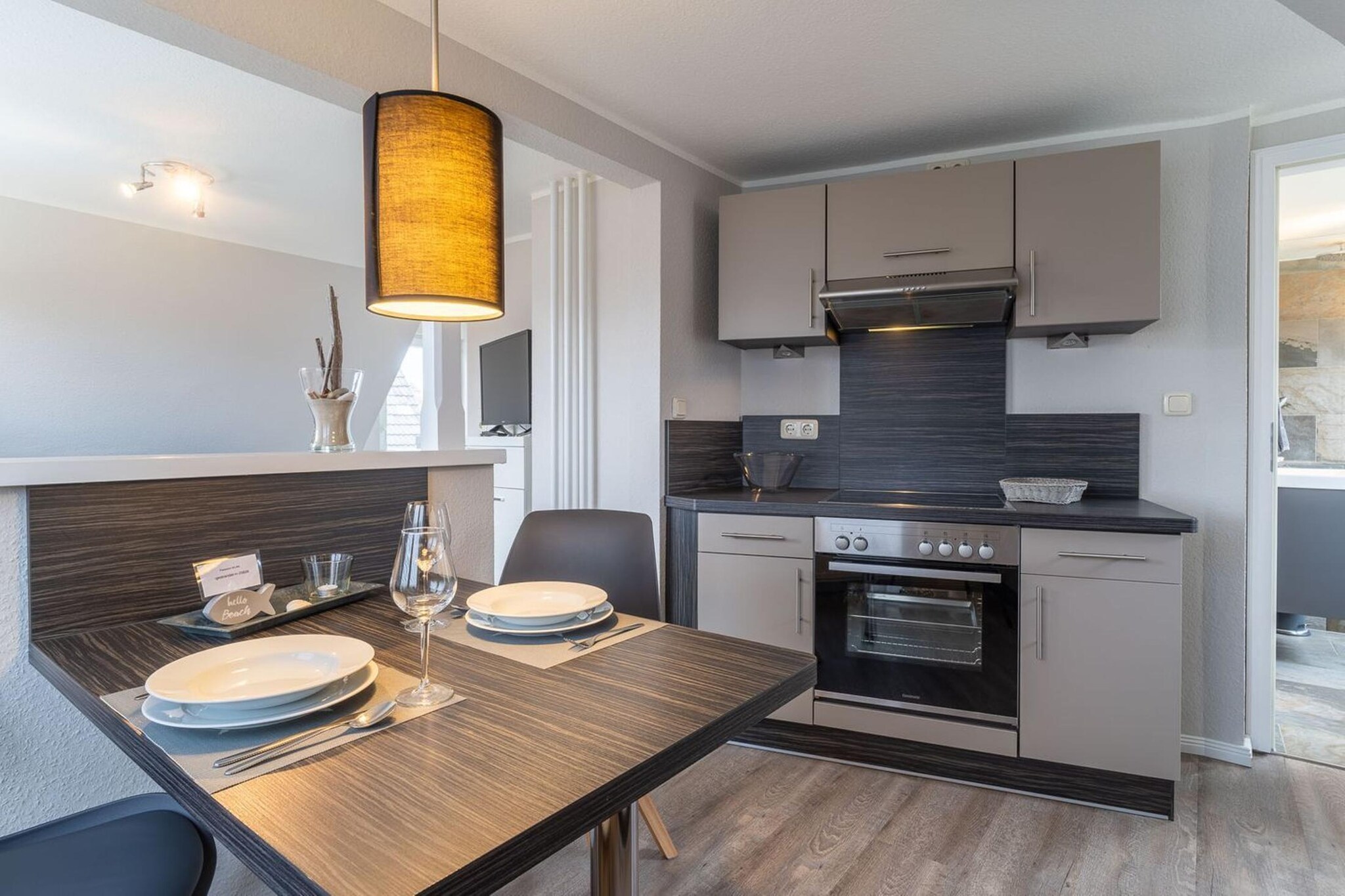 On the 1st floor: (open kitchen(electric kettle, toaster, cooker(4 ring stoves, ceramic), hood, coffee machine, oven, dishwasher, fridge(+ freezer)), Living/diningroom(single sofa bed, TV, dining table(2 persons), radio), bedroom(double bed), bathroom(shower, washbasin, toilet))\n\ntumble dryer(shared with other guests, paid), washing machine(shared with other guests, paid), balcony, heating, garden(shared with other guests), garden furniture, parking, ironing board, iron, hairdryer, Garden shed, Laundry Package incl.