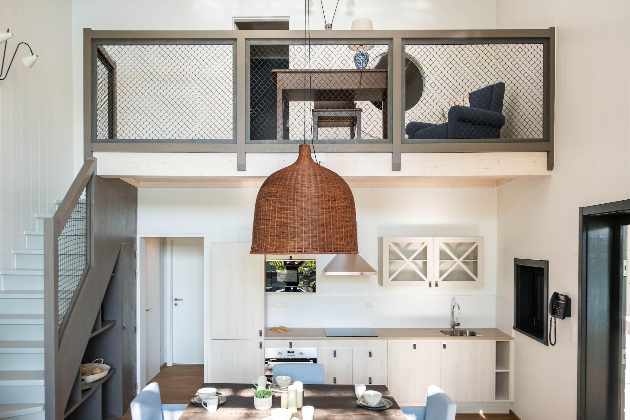 Ground floor: (Living room(TV(smart TV), dining table, fireplace, seating area), open kitchen(electric kettle, cooker, coffee machine(pads), oven, dishwasher, fridge-freezer), bedroom(single bed(80 x 200 cm), single bed(80 x 200 cm)), bathroom(shower(walk-in shower), washbasin), toilet(washbasin, toilet), Internet access)\n\nOn the 1st floor: (bedroom(double bed(160 x 200 cm)), bathroom(bath tub, shower, washbasin, toilet), mezzanine(seating area))\n\nbalcony or terrace, garden, bicycle storage, garden furniture, parking, parking lot(public), pond, swimming pool(shared with other guests, indoor), swimming pool(shared with other guests, outside), boules court(shared with other guests), padel court, lounge set, party games, Charging post for electric cars