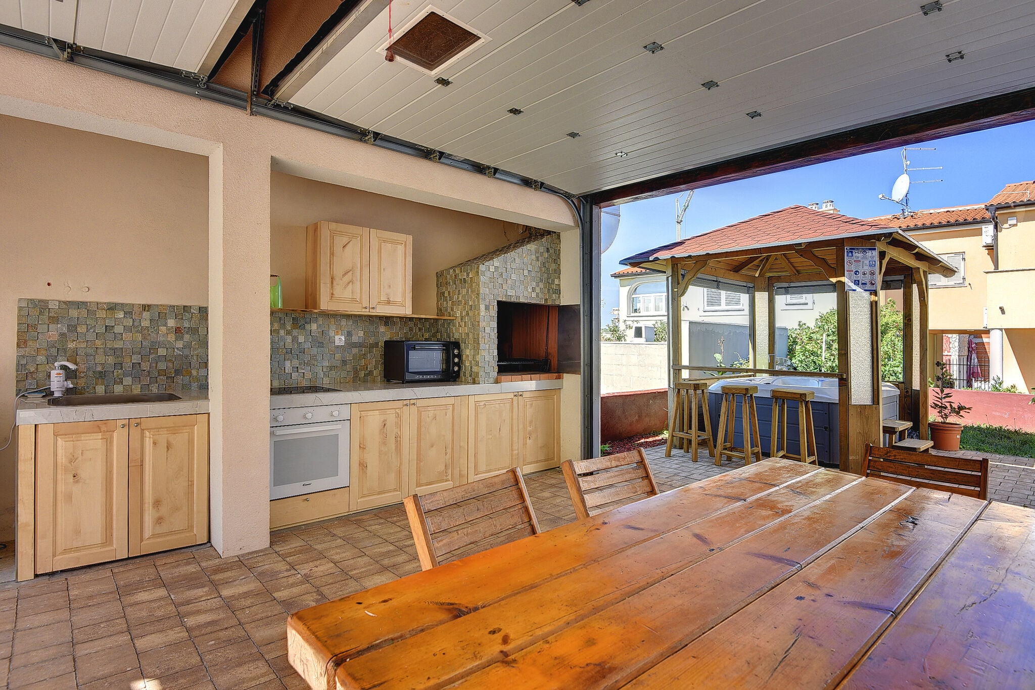 Holiday home with terrace and outdoor kitchen