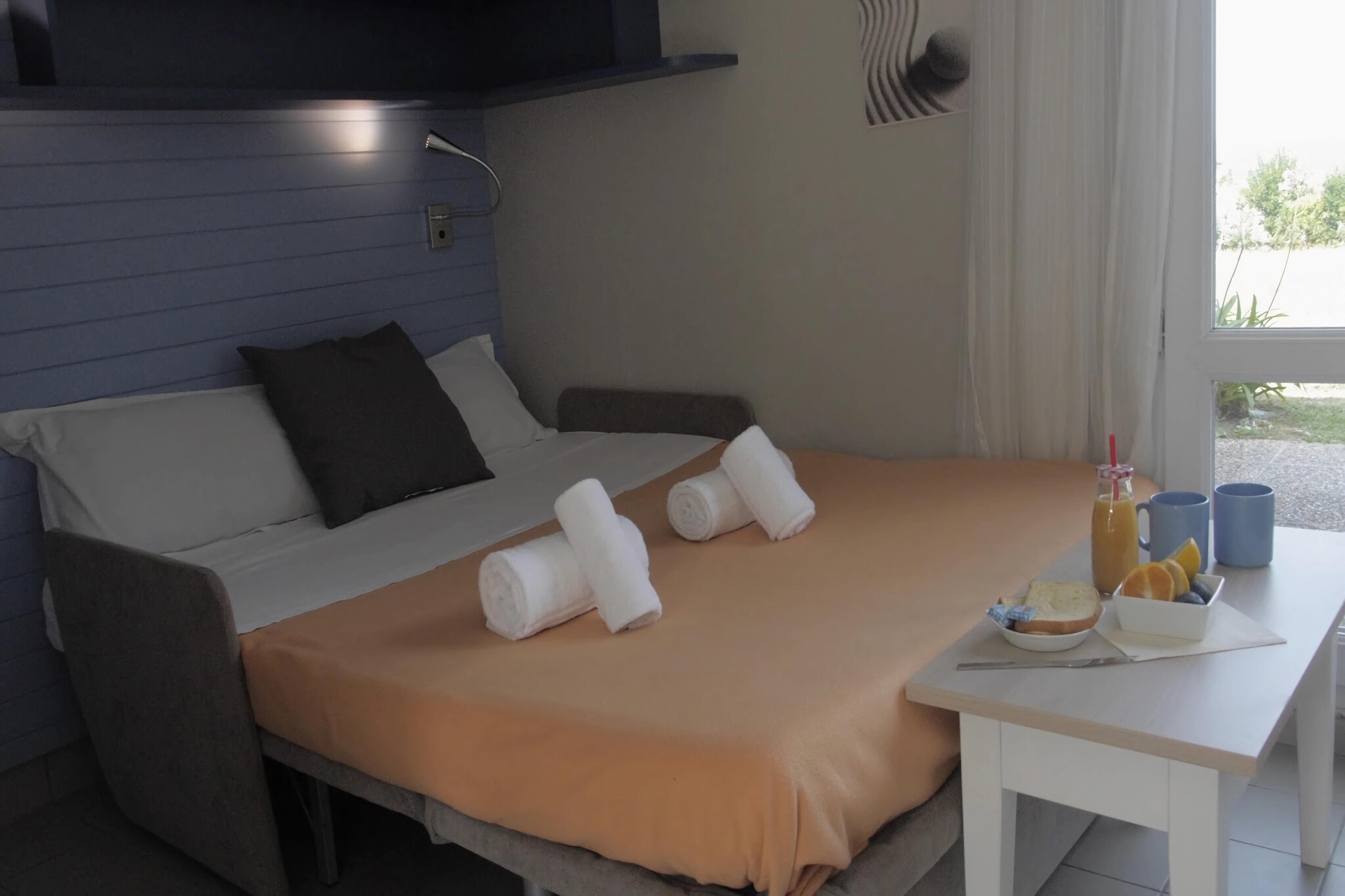 Ground floor: (Living/diningroom(double sofa bed(140 x 190 cm), TV), bathroom(shower), toilet)\n\nOn the 1st floor: (bedroom(single bed(80 x 190 cm), bunk bed(80 x 190 cm)), bedroom(bunk bed(80 x 190 cm)), shower)\n\nKitchenette(hob, electric kettle, coffee machine, microwave, dishwasher, fridge), tumble dryer(shared with other guests), Bubble bath(shared with other guests), washing machine(shared with other guests), terrace, garden furniture, swimming pool(shared with other guests, heated, indoor), boules court(shared with other guests), table tennis table(shared with other guests)
