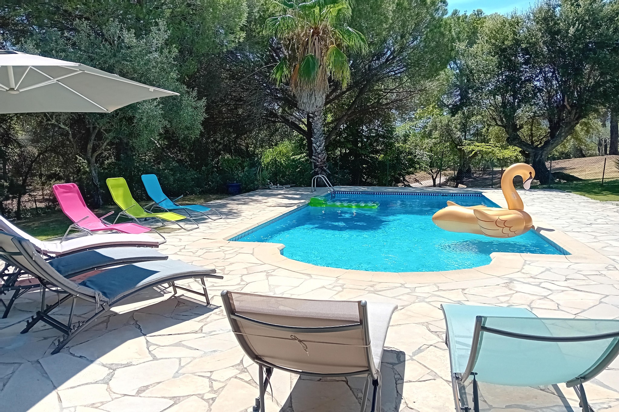 This holiday home nestles at the end of a cul-de-sac, is surrounded by forests and was totally renovated in 2022. It is on the same land as the owners but is completely private and not visible. On the shaded terrace you will find a BBQ and many corners to relax. The swimming pool is shared with the owners and located about 100 meters from the house; it has a section for children (30 cm deep) and is closed. This place is ideal for a vacation with family or friends.
The property is close to many centres and the closest one is La Bouverie 1.5 km away from where you can shop and eat. The other centre is 4 km away and Frejus is 8 km away. If you like watersports, then a visit to the Water Slide Water Park is 1.5 km away. There are many interesting tourist attractions that are worth visiting.
With an elegant and refined, the 3 bedrooms upstairs are air-conditioned, the master bedroom has its own shower room. The 2 other bedrooms share a shower room. A large sofa bed can accommodate 2 children. 
Nice Airport is 65 km away.