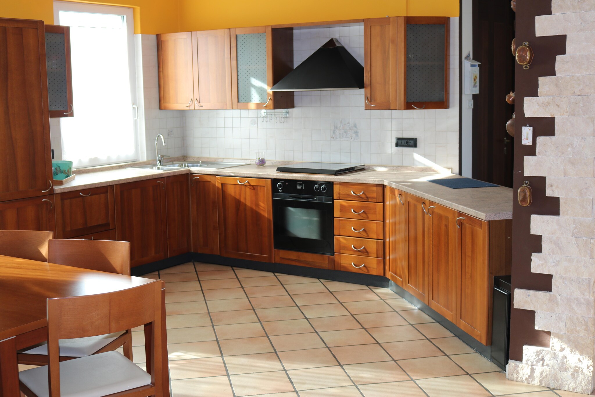 On the 1st floor: (open kitchen(oven, fridge-freezer), Living/diningroom, bedroom(double bed), bedroom(double bed or 2 single beds), bedroom(single sofa bed), bathroom(shower, washbasin, toilet, bidet), TV, washing machine)\n\ngarden(private), parking