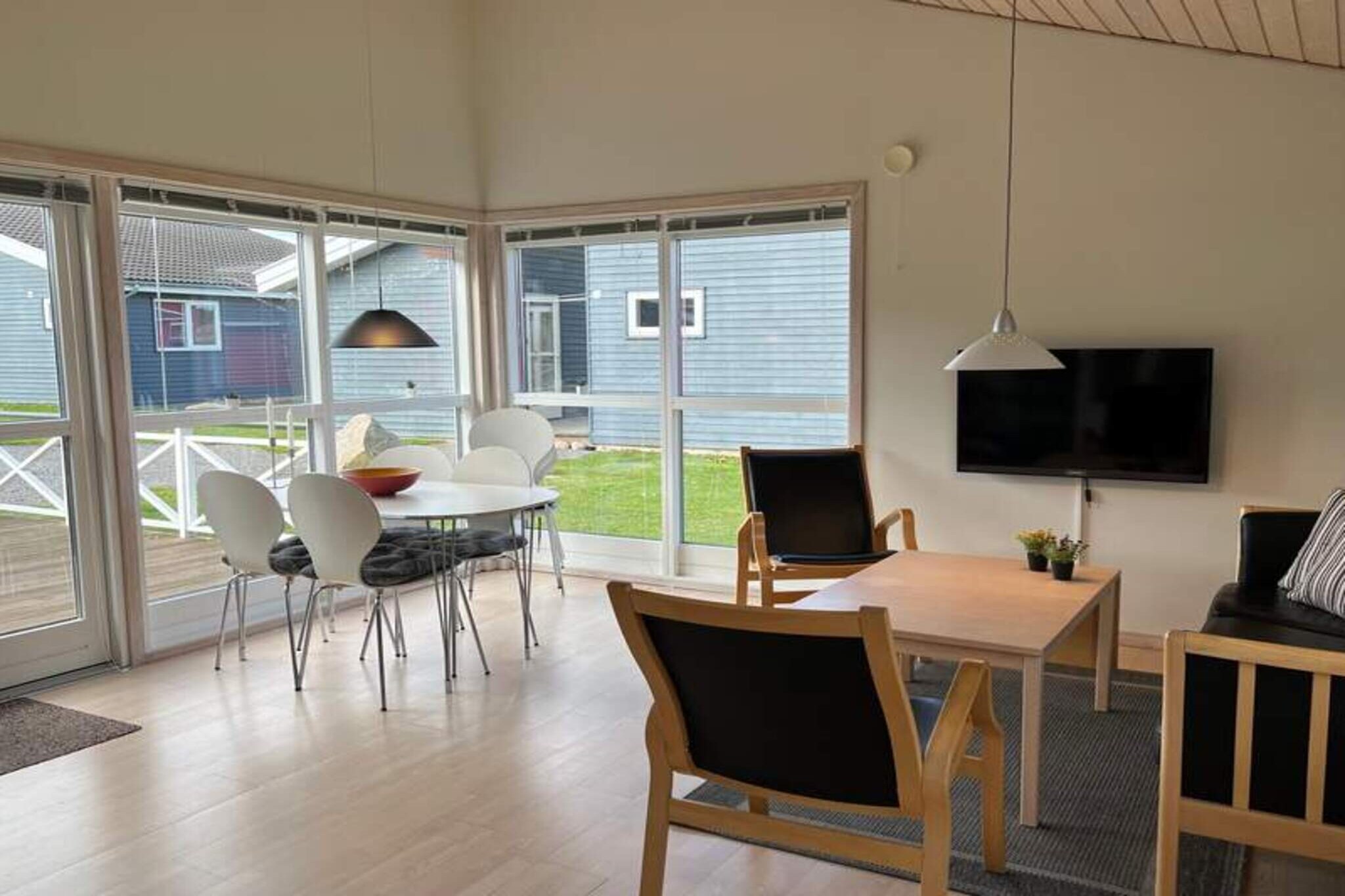 Annex: (2x single bed, fridge)\n\nInternet Access DSL, Kitchen(cooker(electric), coffee machine, microwave, dishwasher, fridge(+ freezer)), Living/bed room(TV(german television channels, danish TV channels (DR1 and TV2), swedish TV channels)), bedroom(double bed), bathroom(washbasin, shower, toilet, washing machine), heating(electric), terrace, garden furniture