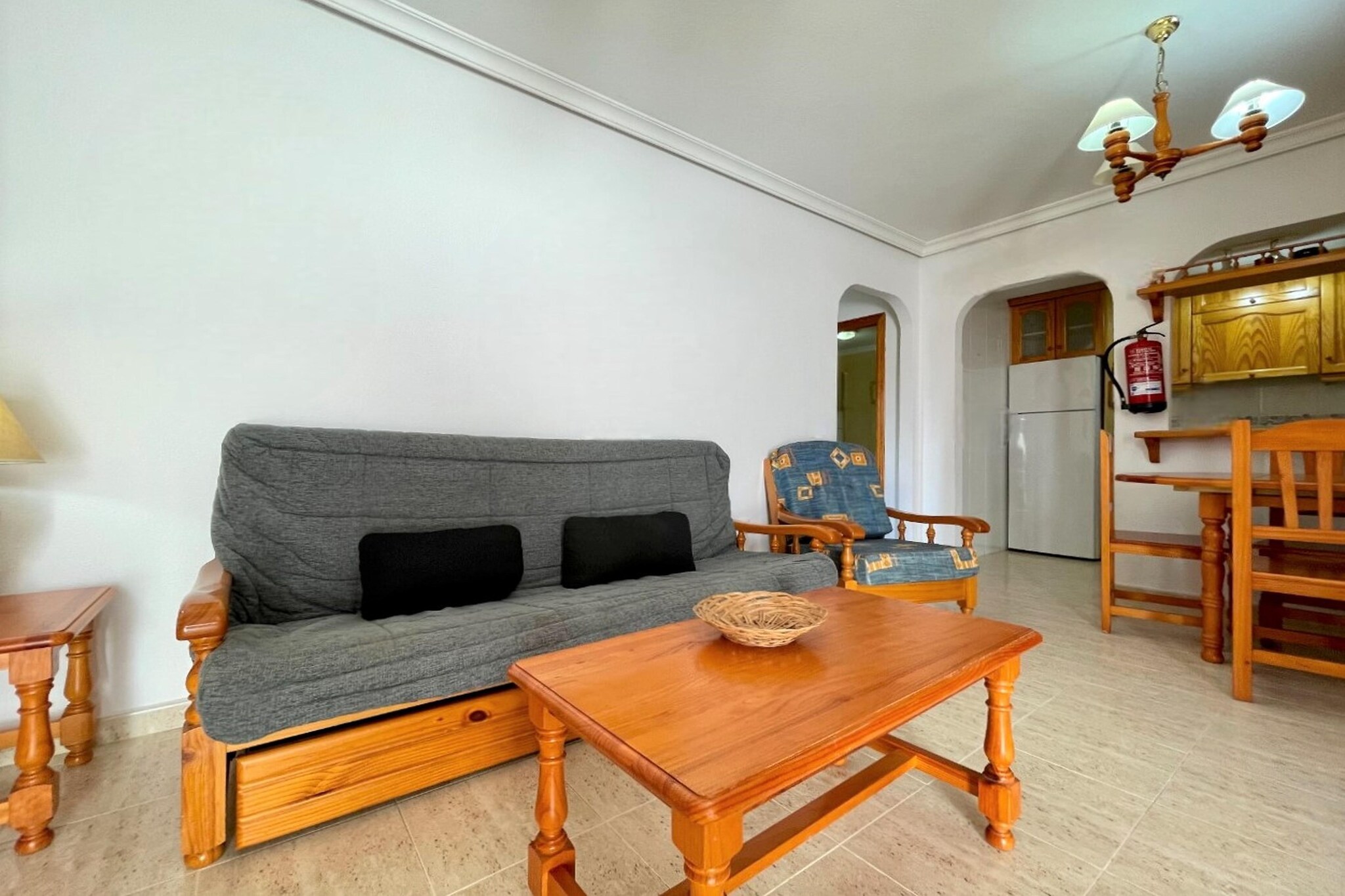 Apartment located in Vera Playa, Costa de AlmerÃa. It is located on the ground floor, with a large fenced outdoor terrace of about 40 m2 and has a living room, kitchen with all the necessary appliances for a pleasant and comfortable stay, laundry room, two bedrooms and a bathroom with a bathtub or shower. In addition, in the outdoor area there is Wi-Fi, a grassy area and tropical plants and a community pool. Throughout the apartment and the bedrooms there are wardrobes, air conditioning, dishwasher, color TV with remote control; American Bar; kitchen with complete utensils and equipped with ceramic hob, oven, microwave with grill, toaster, coffee maker and refrigerator. The bedrooms have a wardrobe, bedding; with iron and board; and in general decorated and prepared to live comfortably. It includes linen and towels. Gated community with access by automatic barrier control. There is direct access to the beach, which can be reached on foot in just 2 minutes.