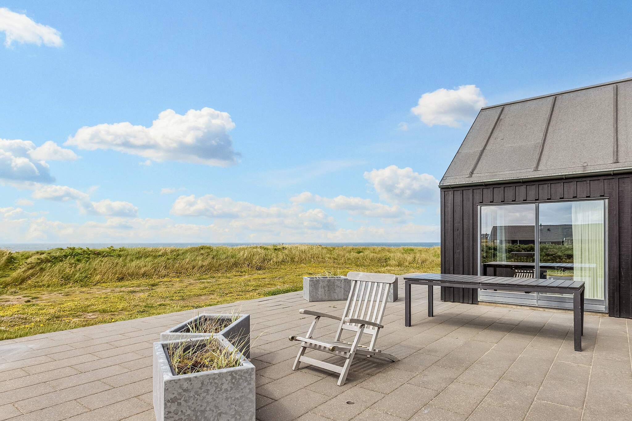 Living room, Kitchen(cooker(2 ring stoves), coffee machine, oven, dishwasher, fridge, freezer(1-59L)), Living/bed room(TV(swedish TV channels), chromecast), bedroom(double bed), bathroom(floor heating)(washbasin, shower, toilet), mezzanine(double bed), mezzanine(double bed), Bubble bath(indoor, heated), heating(electric), terrace, garden furniture, sun loungers, air to air heatpump