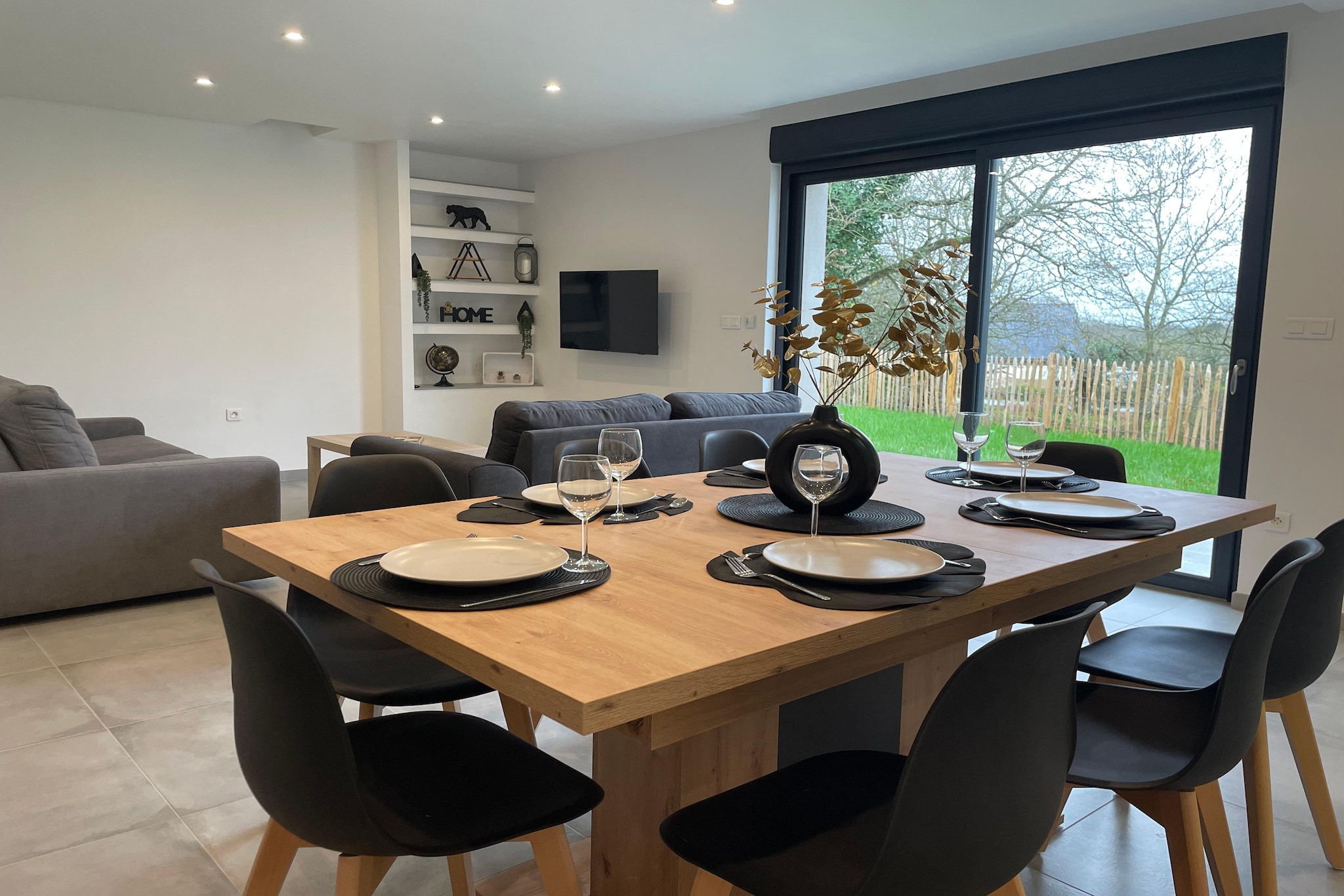 Ground floor: (open kitchen(electric kettle, toaster, cooker, coffee machine, oven, microwave, dishwasher, fridge, freezer), Living/diningroom(double sofa bed, TV(no dutch television channels, no german television channels)), bedroom(double bed(140 x 190 cm)), bathroom(shower, toilet), toilet, storage)\n\nOn the 1st floor: (bedroom(double bed(140 x 190 cm)), bedroom(double bed(140 x 190 cm)), bedroom(double bed(140 x 190 cm)), bathroom(shower, toilet), bathroom(shower, toilet), bathroom(shower, toilet))\n\ngarage, washing machine, terrace, garden furniture, parking, parking, parking, high chair, baby crib(free)