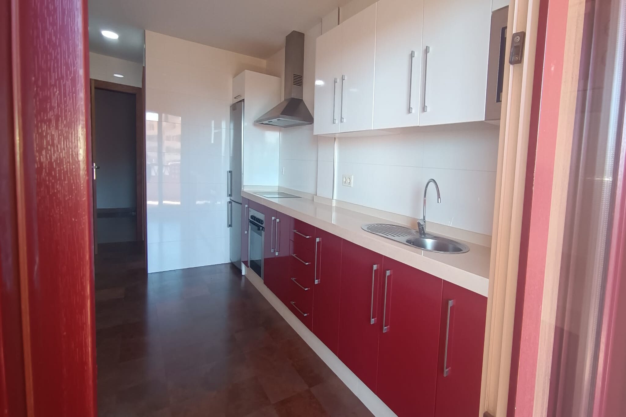 Ground floor: (Living room(TV, seating area), Kitchen(cooker, oven, microwave, fridge-freezer), bedroom(double bed or 2 single beds), bedroom(double bed or 2 single beds), bedroom(double bed or 2 single beds), bathroom(bath tub))\n\nbalcony or terrace, garden, parking lot(public), swimming pool(shared with other guests)