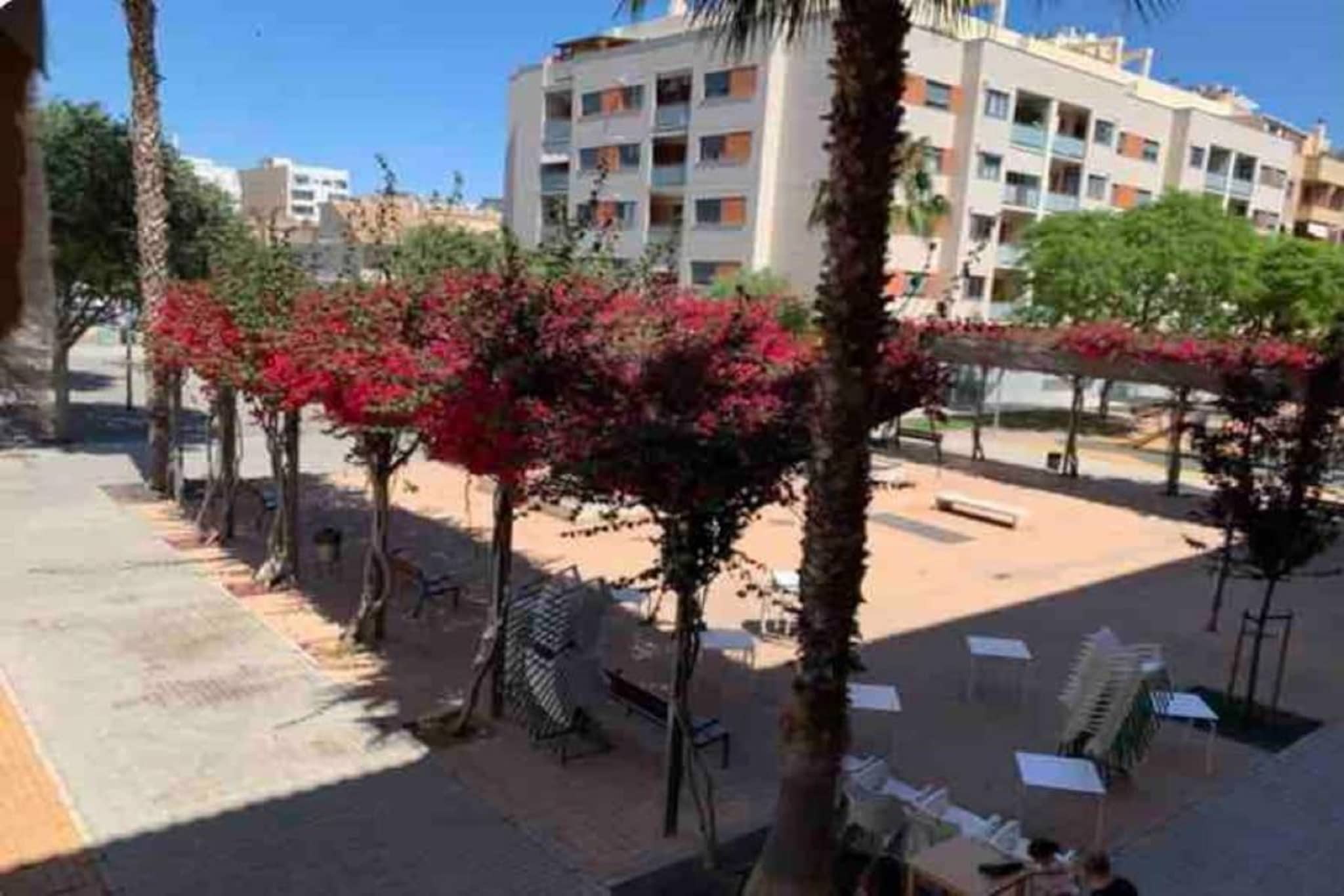 Ground floor: (Living room(double sofa bed, TV, decorative fireplace, streamingservice, stereo unit), Kitchen(dining table, hob, electric kettle, toaster, hood, oven, microwave, fridge-freezer), bedroom(small double bed, TV), bedroom(double bed), bedroom(double bed), bathroom(shower, washbasin, toilet), bathroom(bath tub, washbasin, toilet))\n\nwashing machine, patio, air conditioning, garden(non-landscaped garden), garden furniture, BBQ, parking, play equipment