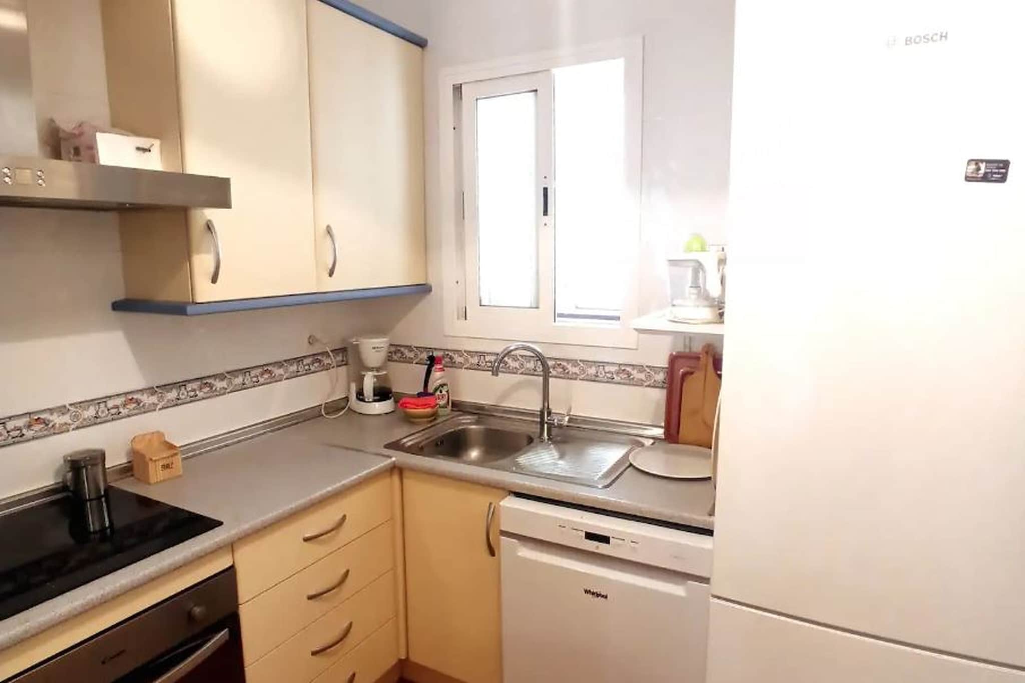 Ground floor: (Entrance(reachable from the outside), Living room(TV(flatscreen), dining table, stove, seating area), Kitchen(hob, hood, coffee machine, oven, microwave, dishwasher, fridge-freezer, washing machine, Juicer), bedroom(double bed), bedroom(single bed, single bed), bathroom(shower, washbasin, toilet), bathroom(bath tub, washbasin, toilet, bidet), balcony or terrace, air conditioning)\n\nterrace, garden, parking, ironing board