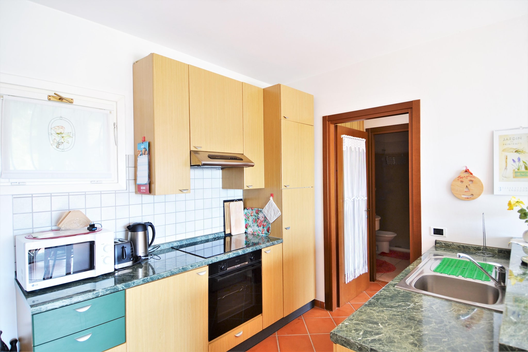 Charming Stay in Central Luino
Located in the heart of Luino, this delightful mezzanine apartment is just 300 m from the town center and 400 m from Lake Maggioreâ€™s peaceful shores. With a bright living room, dining area, and open kitchen, it's perfect for couples or small families seeking a cozy retreat with easy access to lakeside charm.

Comfort & Convenience
The apartment features a comfortable double bedroom, a modern bathroom with a shower and bidet, and a balcony for morning coffee or evening unwinding. The kitchen is equipped with a hob, oven, fridge-freezer, and washbasin. Guests can enjoy a shared garden, outdoor pool, parking, and free Wi-Fi, offering all the essentials for a relaxed stay.

Explore Lake Life & Local Flavors
Luino is known for its vibrant weekly market, scenic promenade, and ferry links to the Borromean Islands. Stroll through Parco a Lago or explore the lakefront. For dining, enjoy local flavors at Ristorante Camin Hotel Colmegna or La Vecchia Pesa. With everything within walking distance, this location promises an authentic and relaxing Italian experience.