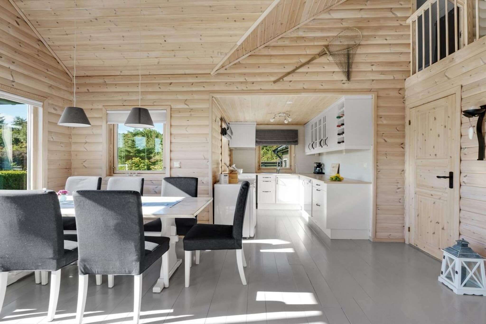 Annex: \n\nBoat: \n\nopen kitchen(cooker(electric), hood, coffee machine(filter), oven, waffle iron, dishwasher, fridge, freezer(200-249L), washing machine), Living/bed room(35 m2)(TV(german television channels)), bedroom(double bed), bedroom(double bed), bedroom(2x single bed), bathroom(floor heating)(bathtub or shower, washbasin, toilet), heating(electric), terrace(100 m2), garden furniture, BBQ, parking
