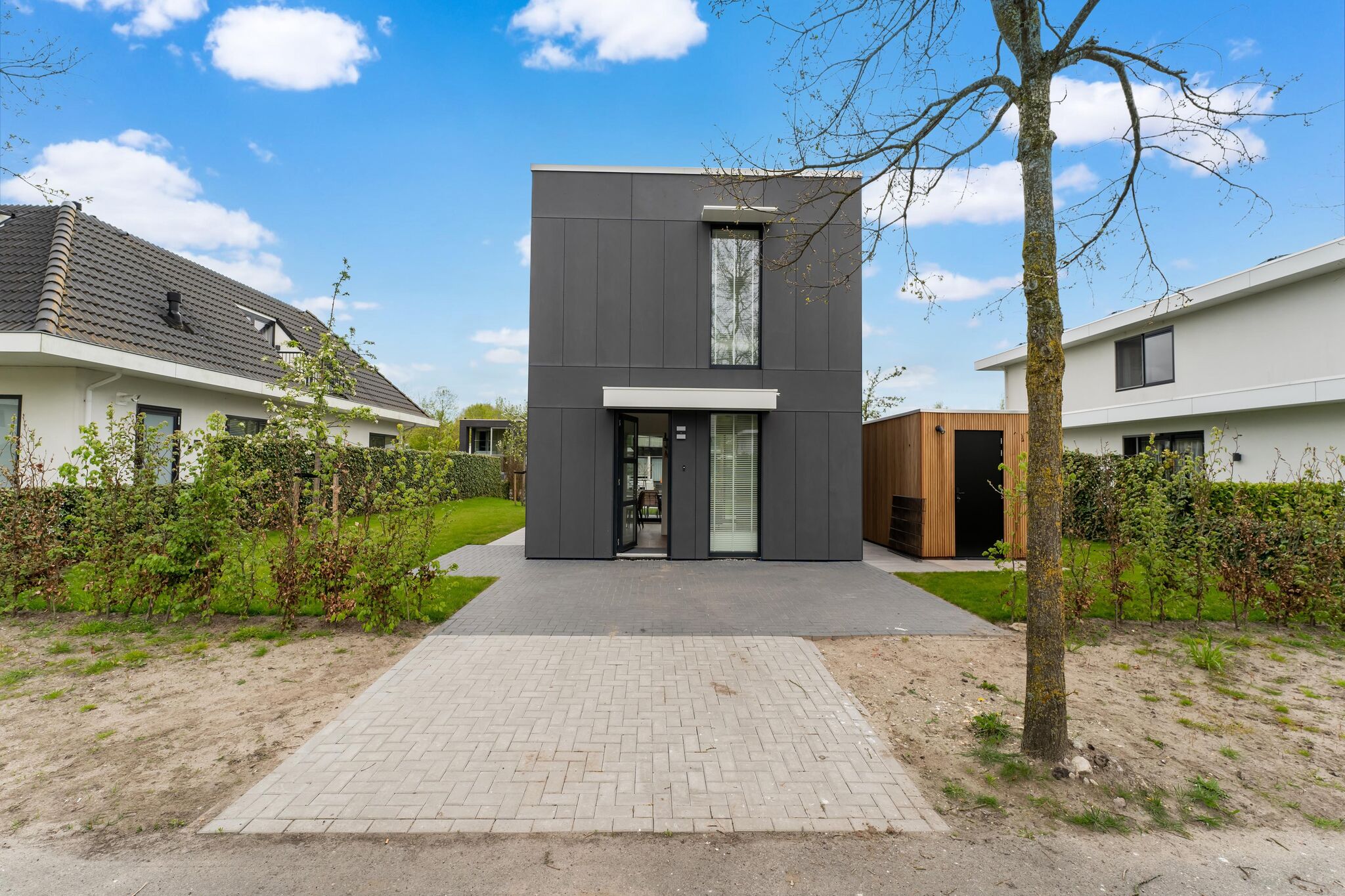 Maison cube confortable sur l'eau près de Harderwijk