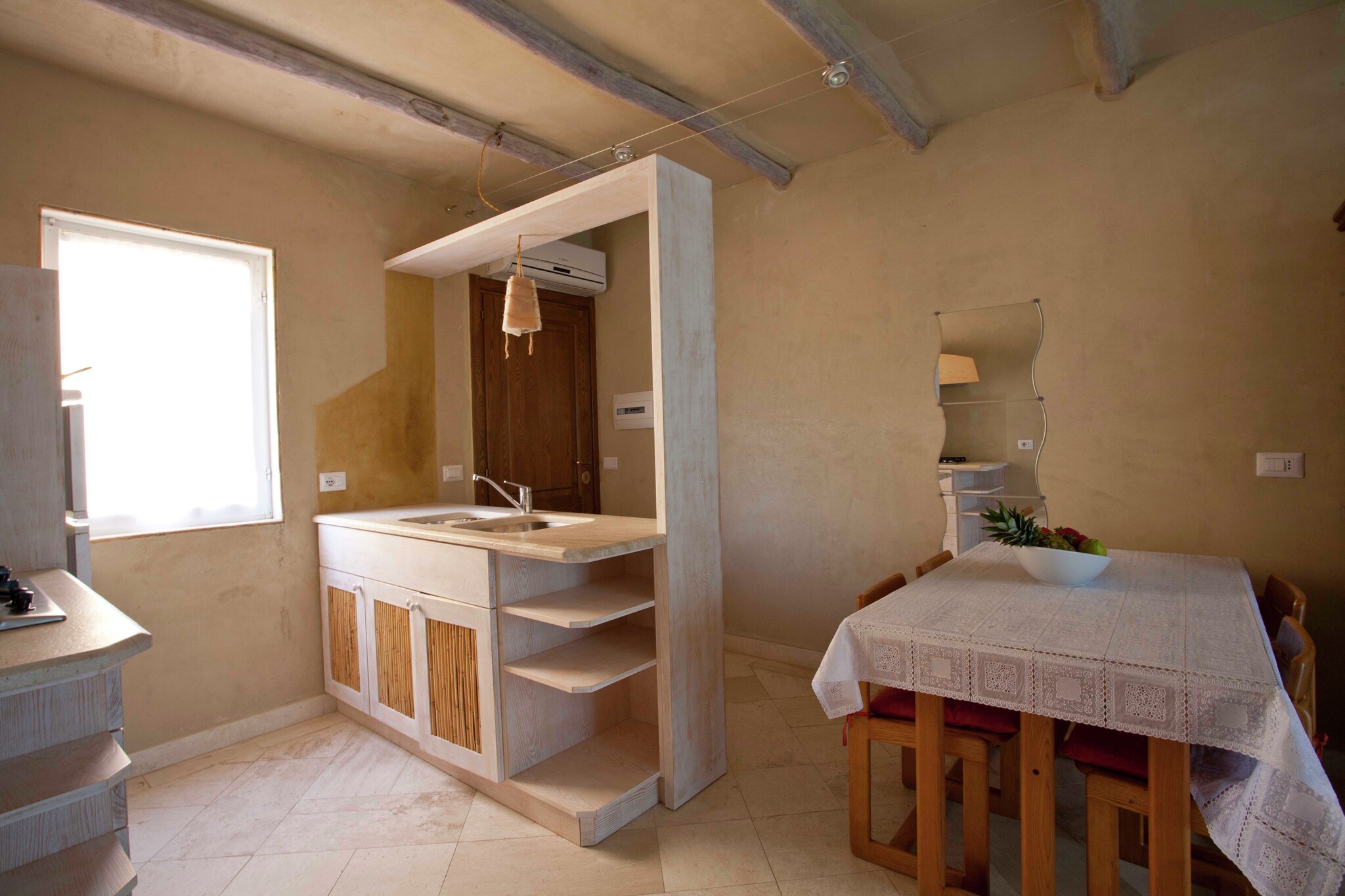 On the 1st floor: (Living room(double sofa bed, TV), open kitchen(cooker, fridge-freezer), bedroom(double bed, children\'s bed), bedroom(double bed or 2 single beds), bathroom(shower, washbasin, toilet), air conditioning)\n\nwashing machine(paid), parking, tennis court(paid)