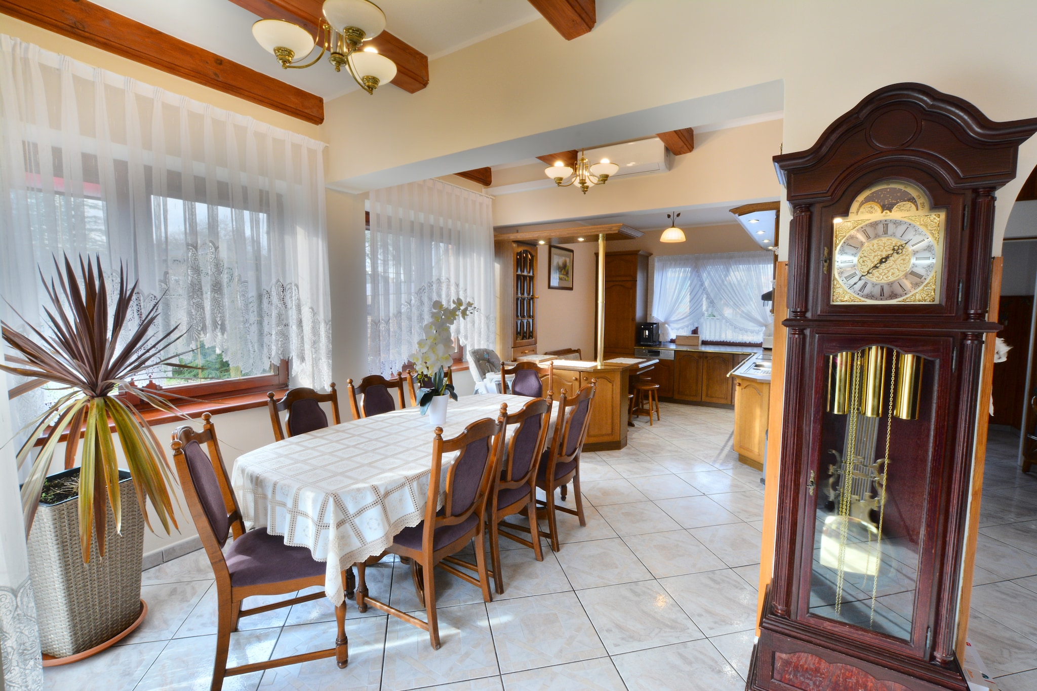 Ground floor: (Living room(TV(flatscreen, satellite, german television channels, international television channels)), dining room(dining table(8 persons)), open kitchen(dining table, hob(4 ring stoves, ceramic, electric), electric kettle, hood, coffee machine, oven, microwave, dishwasher, fridge-freezer), toilet(washbasin, toilet), sauna(private, 3 persons)(shower))\n\nOn the 1st floor: (bedroom(double bed, TV(flatscreen, satellite, german television channels, international television channels)), bedroom(double bed, TV(flatscreen, satellite, german television channels, international television channels)), bathroom(shower, washbasin, washbasin, toilet, bidet, washing machine, hairdryer))\n\nOn the 2nd floor: (bedroom(single bed, single bed, double sofa bed, TV(flatscreen, satellite, german television channels, international television channels)))\n\nReception, Internet access, Play area, sauna(private), balcony, heating(central), air conditioning, terrace(roofed), garden(private, fenced, 500 m2), garden furniture, BBQ(charcoal), parking, trampoline(shared with other guests), pond, slide(shared with other guests), ironing board, iron, Swing set