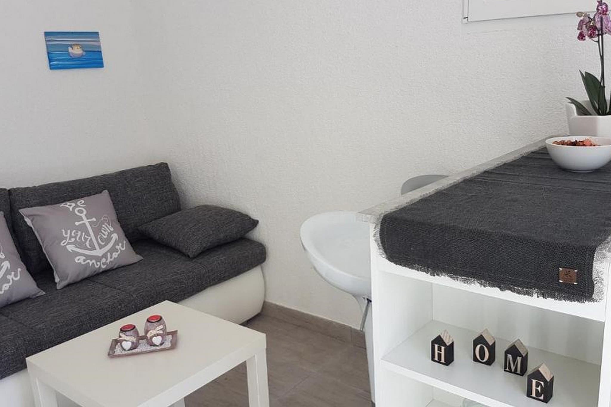 Apartments Katarina are located in a small village Rukavac, on the island of Vis. 

Apartments Katarina offers accommodation in five units. All the units have access to a private furnished balcony or terrace, which makes this place a perfect spot to enjoy your summer holiday. 

You will have access to a common BBQ grill with an outdoor dining area. 

Free private parking is provided, a reservation is not needed.

Luggage storage is possible prior to check-in and after check-out, so you can explore the city a little more before your departure.

Pets are allowed with an additional charge of 5 EUR per day. 

Baby cot and highchair are available upon request.

This one bedroom apartment with terrace can accommodate up to three people. It features air-conditioning as well as SAT LCD TV. The open space living room comes with a sofa and sitting area, and it's combined with the equipped kitchen and dining area. The private bathroom comes with a shower and toilet.
Free toiletries, hair dryer as well as linens and towels are at your disposal.

If you want to spend your vacation in a peaceful and quiet environment, far from the city crowds, and also to have nearby all you need during your holidays, Apartments Katarina is the best choice for you. The beach is only 50 m from the property! Due to the properties' good location, you can find restaurants and bars only 100 m away from the property. The market is situated 1 km from the property.

Airport is located 48 km from the property, while ferry port is 9 km away.