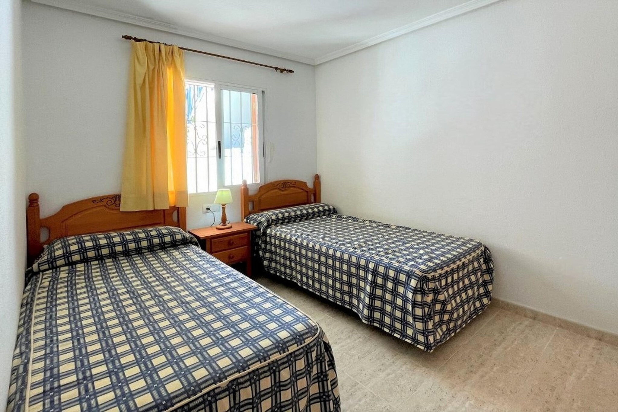 Ground floor: (Entrance(shared entrance, reachable from the outside))\n\nOn the 1st floor: (Entrance, open kitchen(hob, toaster, hood, coffee machine, oven, microwave, dishwasher, fridge-freezer), Living/diningroom(double sofa bed, TV(flatscreen), dining table, seating area), bedroom(double bed(135 x 190 cm)), bedroom(single bed(90 x 190 cm), single bed(90 x 190 cm)), bathroom(bathtub with shower, washbasin, toilet), washing room(washing machine, ironing board, iron), air conditioning, terrace(private), garden furniture, air to air heatpump)\n\ngarden(shared with other guests, illuminated), parking lot(public), swimming pool(shared with other guests, outside, opened from Apr upto and including 1/2 Sep)