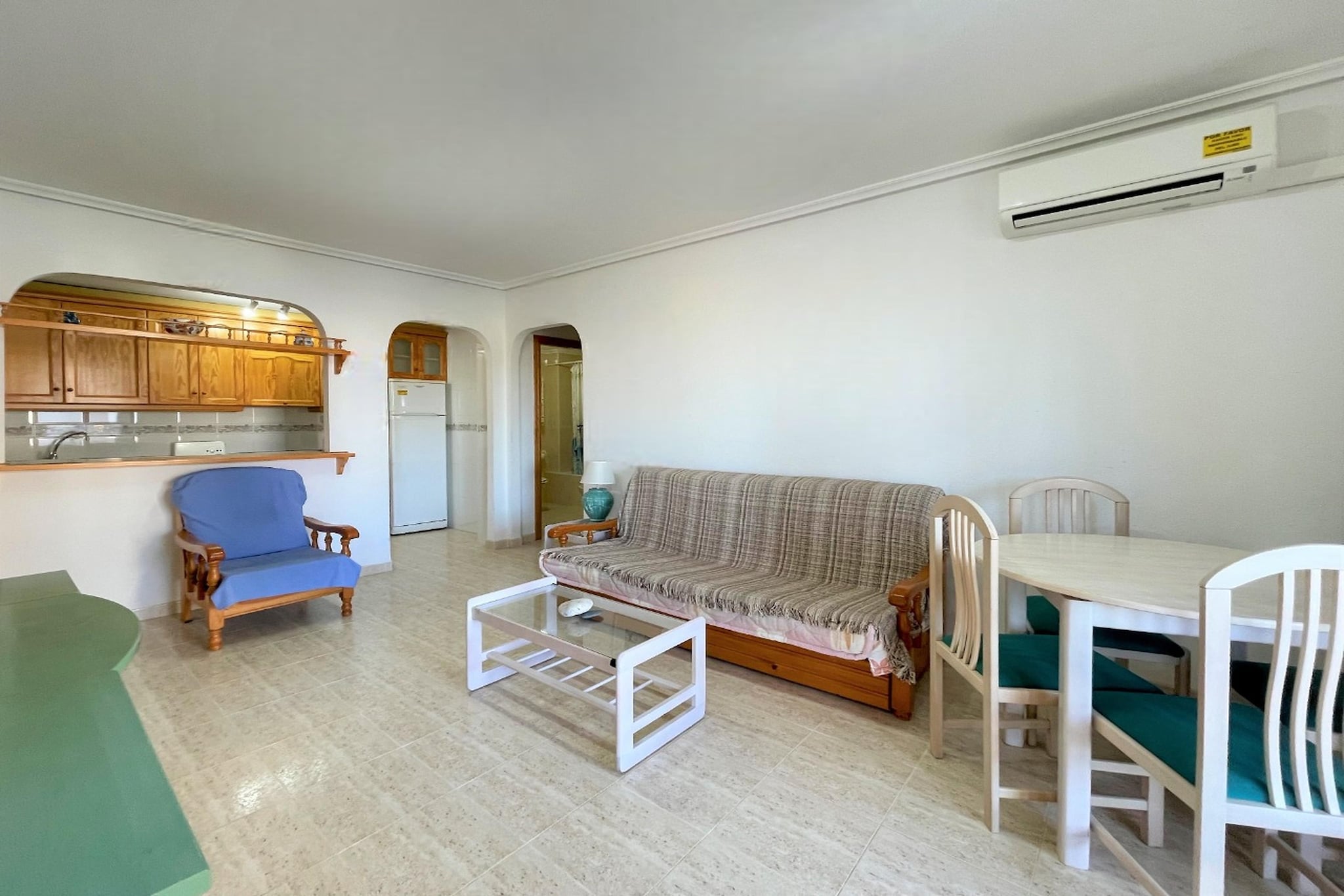 This lovely apartment is within walking distance of the beach and is equipped with all the ingredients for a successful holiday in the sun. It also comfortably accommodates 2 couples or a family.
Playa de Vera is a beautiful beach located on the southeastern coast of Spain, in the AlmerÃa region. It is known for its clear water, fine sand and extensive coastline of almost 7 km long. The beach is popular among tourists due to its pleasant climate and the many activities on offer, such as water sports, cycling and walking along the coastline. There are also several bars, restaurants and shops close to the beach, making it a popular destination for locals and visitors alike. Playa de Vera is also known for its nudist beach.
This nice apartment with a large outdoor terrace is located on the first or second floor (without elevator). It has a living room, a well-equipped kitchen, comfortable bedrooms and a bathroom with bath or shower. You have WiFi and access to the outdoor area with a lawn, tropical plants and a communal swimming pool. Air conditioning provides cooling in this nice apartment in a gated community with direct access to the beach.