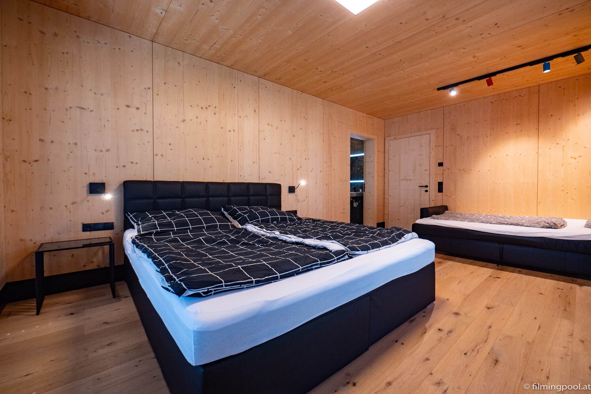 On the 1st floor: (Entrance, bedroom(double bed, double sofa bed), bathroom(shower, toilet), toilet, balcony)\n\nAttic: (Living room(TV, seating area), open kitchen(dining table, hob(4 ring stoves, ceramic), oven, dishwasher, fridge-freezer), bedroom(double bed), bedroom(double bed), bathroom(shower, toilet), roof terrace)\n\nski storage, garage, garage, washing machine(paid), bicycle storage, lift