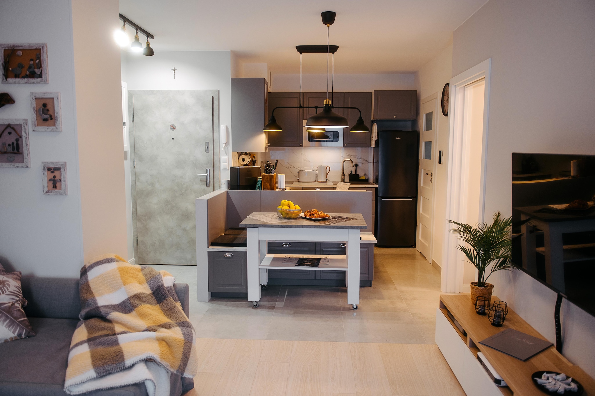 On the 1st floor: (open kitchen(dining table(5 persons), hob(2 ring stoves, induction), electric kettle, toaster, hood, coffee machine, oven, microwave, dishwasher, fridge-freezer), Living/diningroom(double sofa bed, TV(flatscreen, satellite, german television channels)), bedroom(double bed), bedroom(single bed, single trundle bed), bathroom(shower, washbasin, toilet, bidet, hairdryer))\n\nInternet access, Parking, baby bath, washing machine, balcony, heating(central), garden furniture, swimming pool(shared with other guests, heatable, indoor, including separate childrenâ€™s swimming pool (depth 50cm)), lift, high chair, ironing board, iron, baby crib(free)